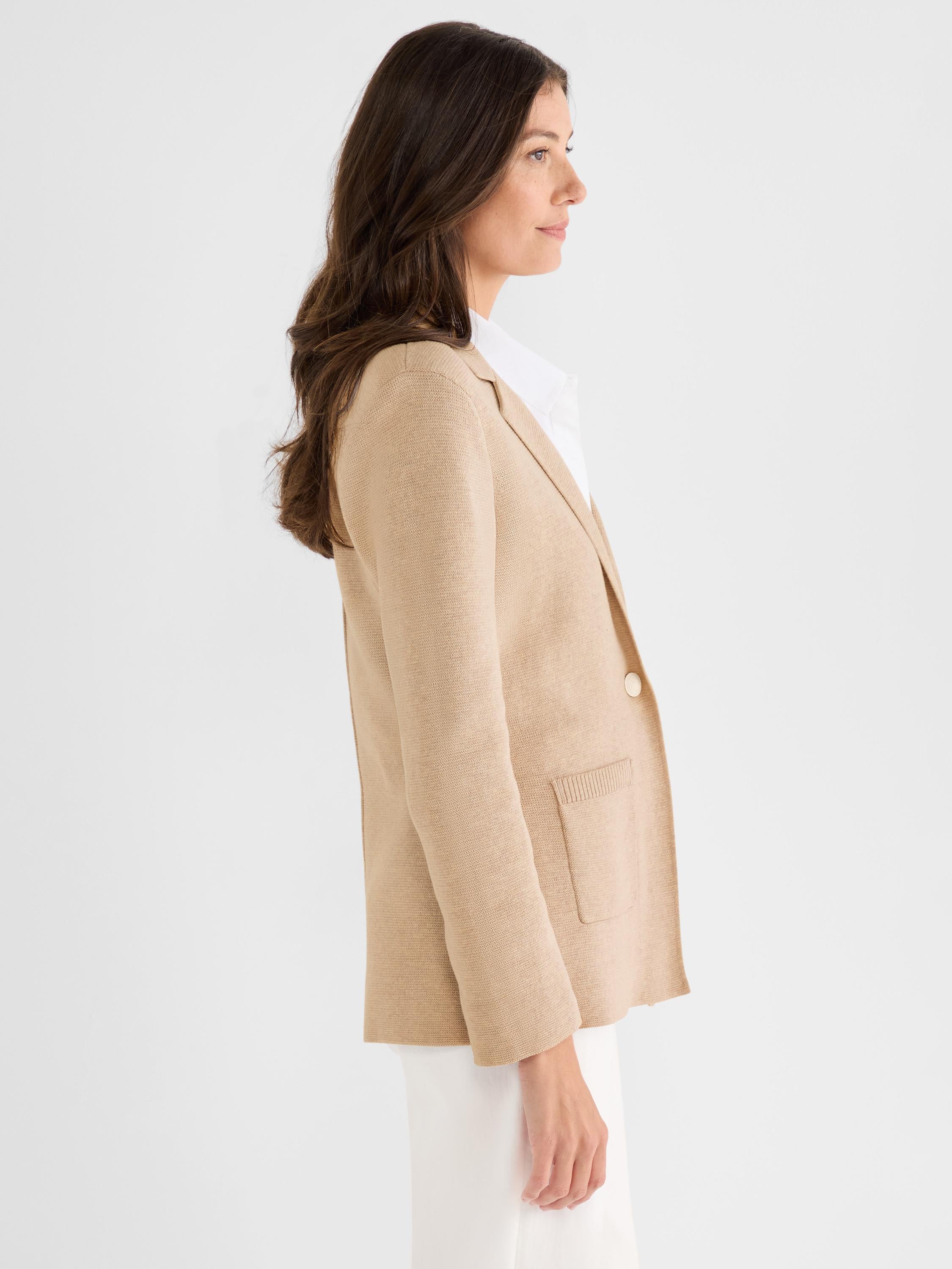 A tan knit blazer featuring a classic fit, notch lapels, a single button closure, and a front patch pocket.