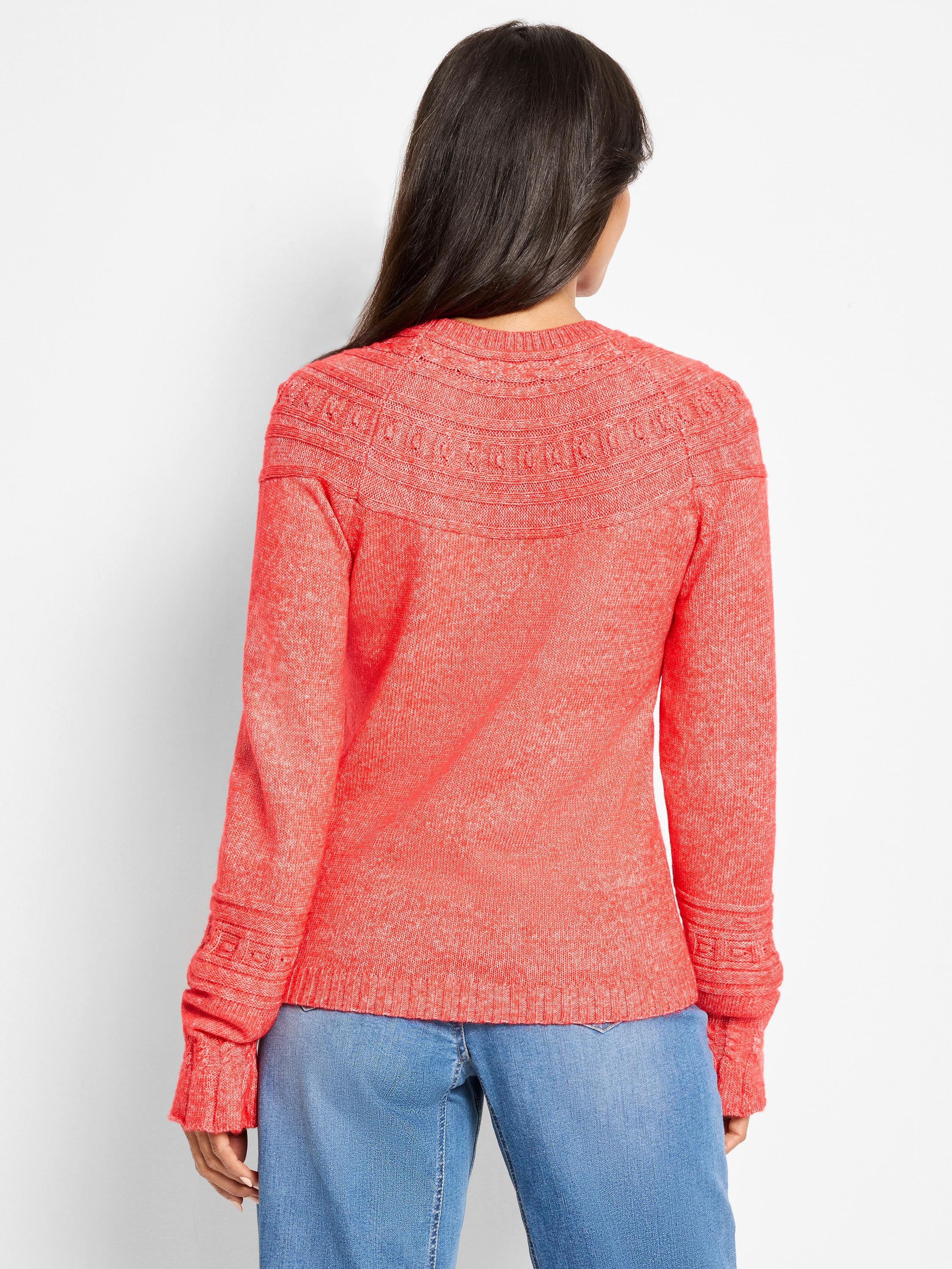 Marled coral sweater, back view. Features a round textured dot yoke and ribbed cuffs.