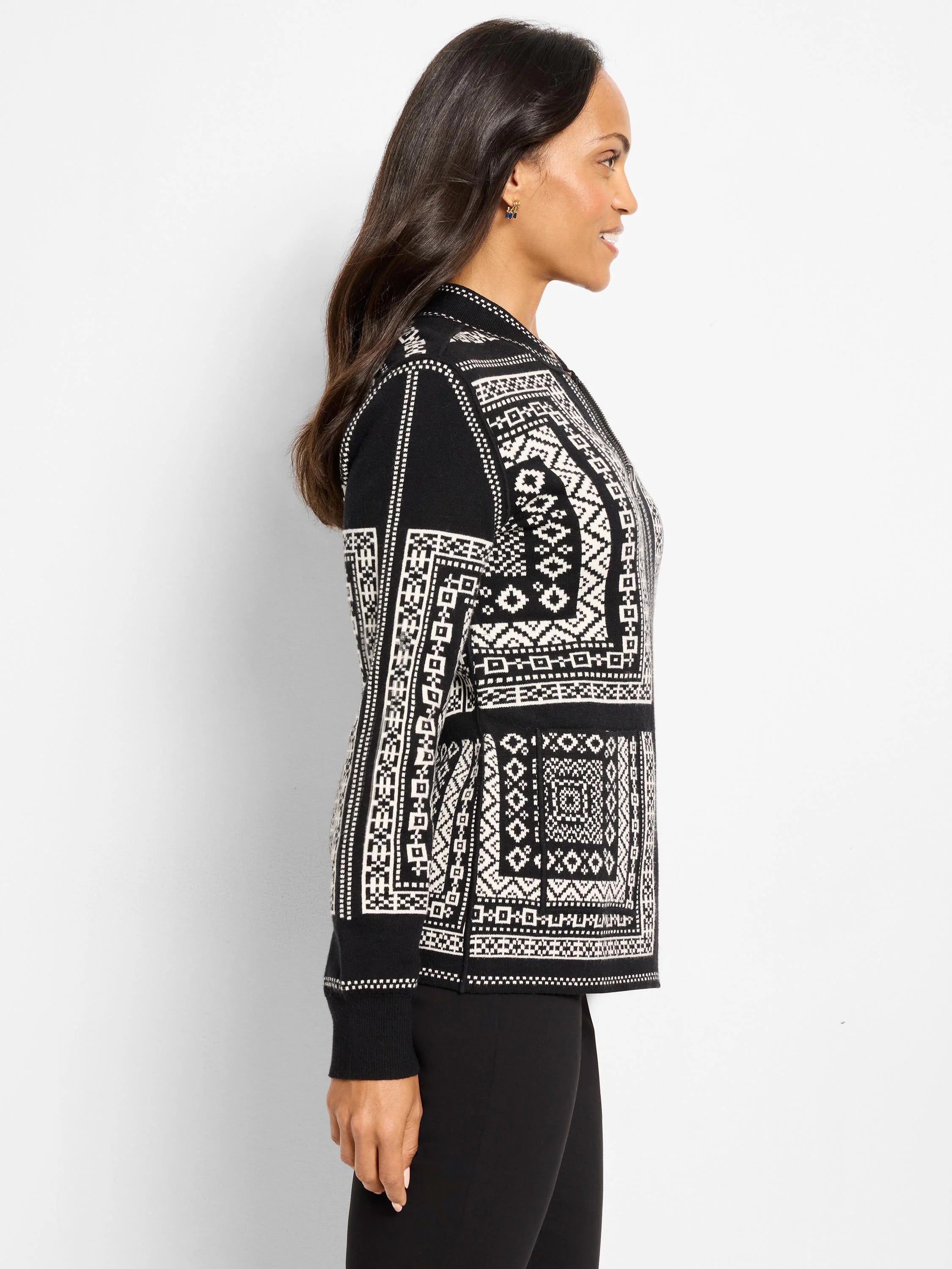 Black & white reversible jacket with intricate geometric Nordic pattern and solid cuffs.