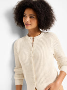 Cream open-knit cardigan featuring a button-front closure, ribbed collar, cuffs, and hem.