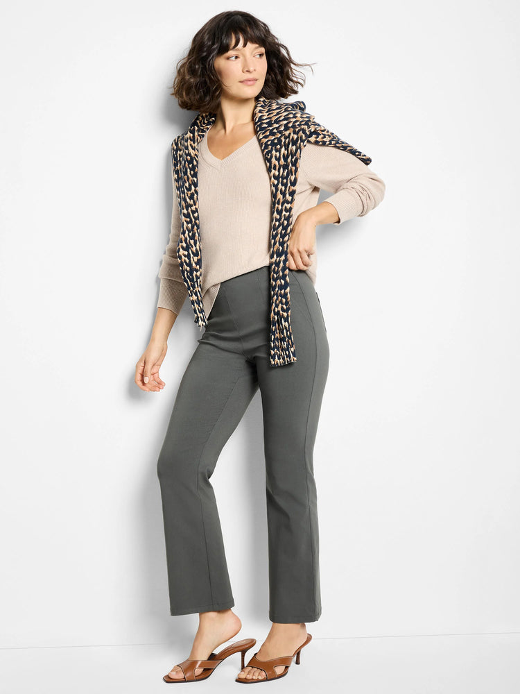 Light beige waffle stitch V-neck sweater.