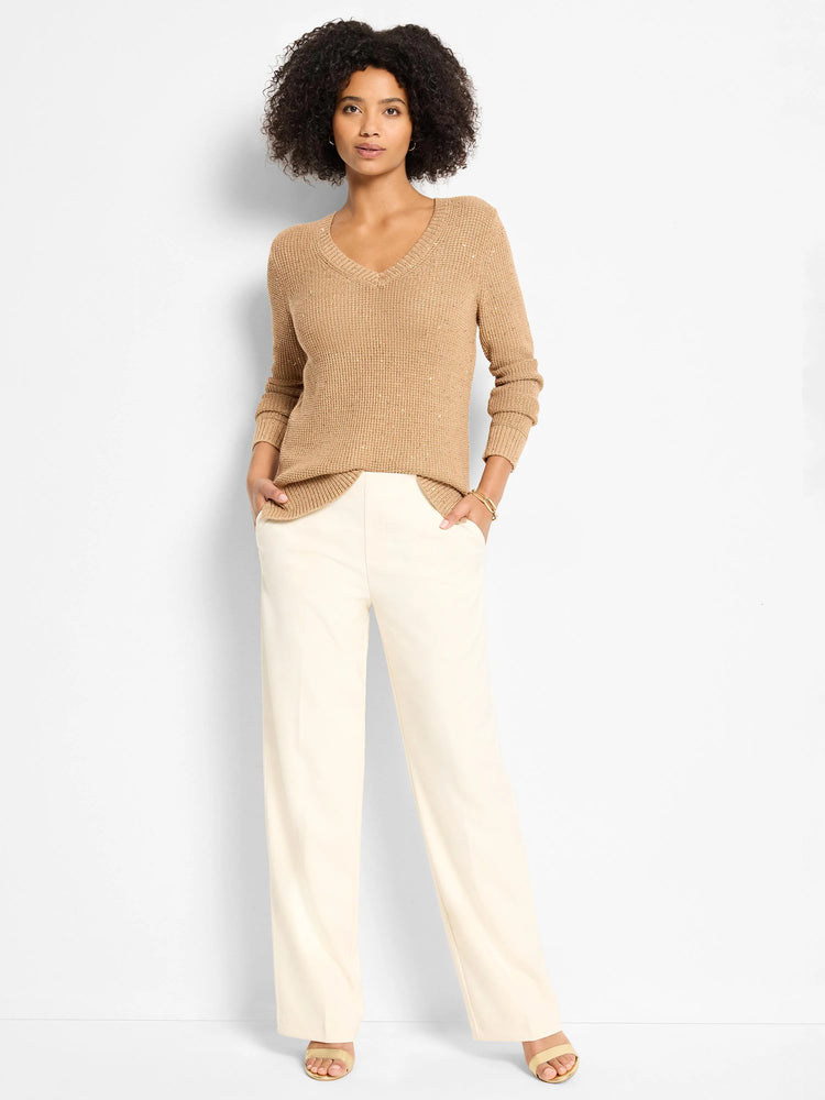 Tan shimmer waffle V-neck sweater with long sleeves.