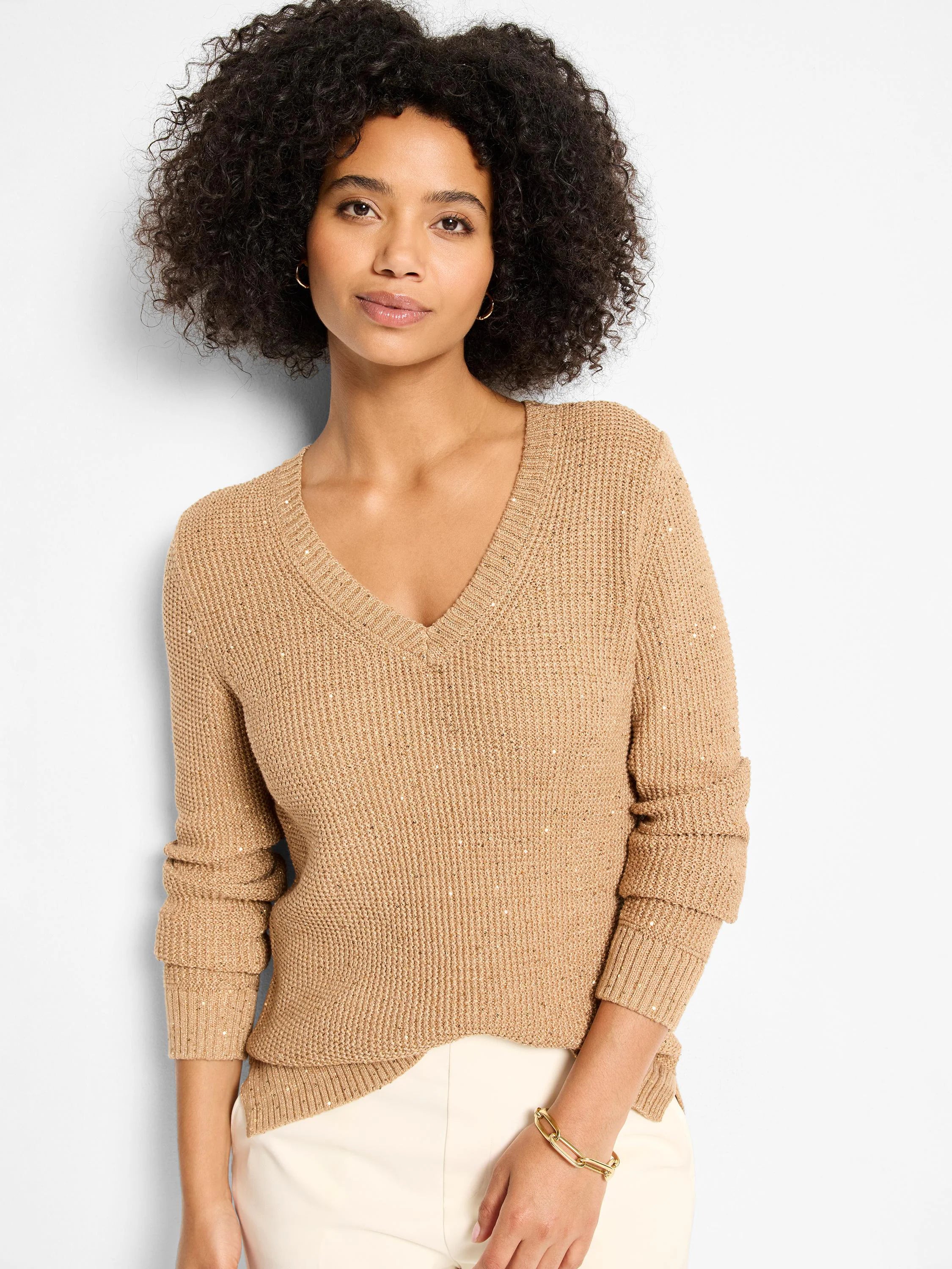 Camel V-neck sweater featuring a textured waffle knit with subtle golden shimmer throughout.
