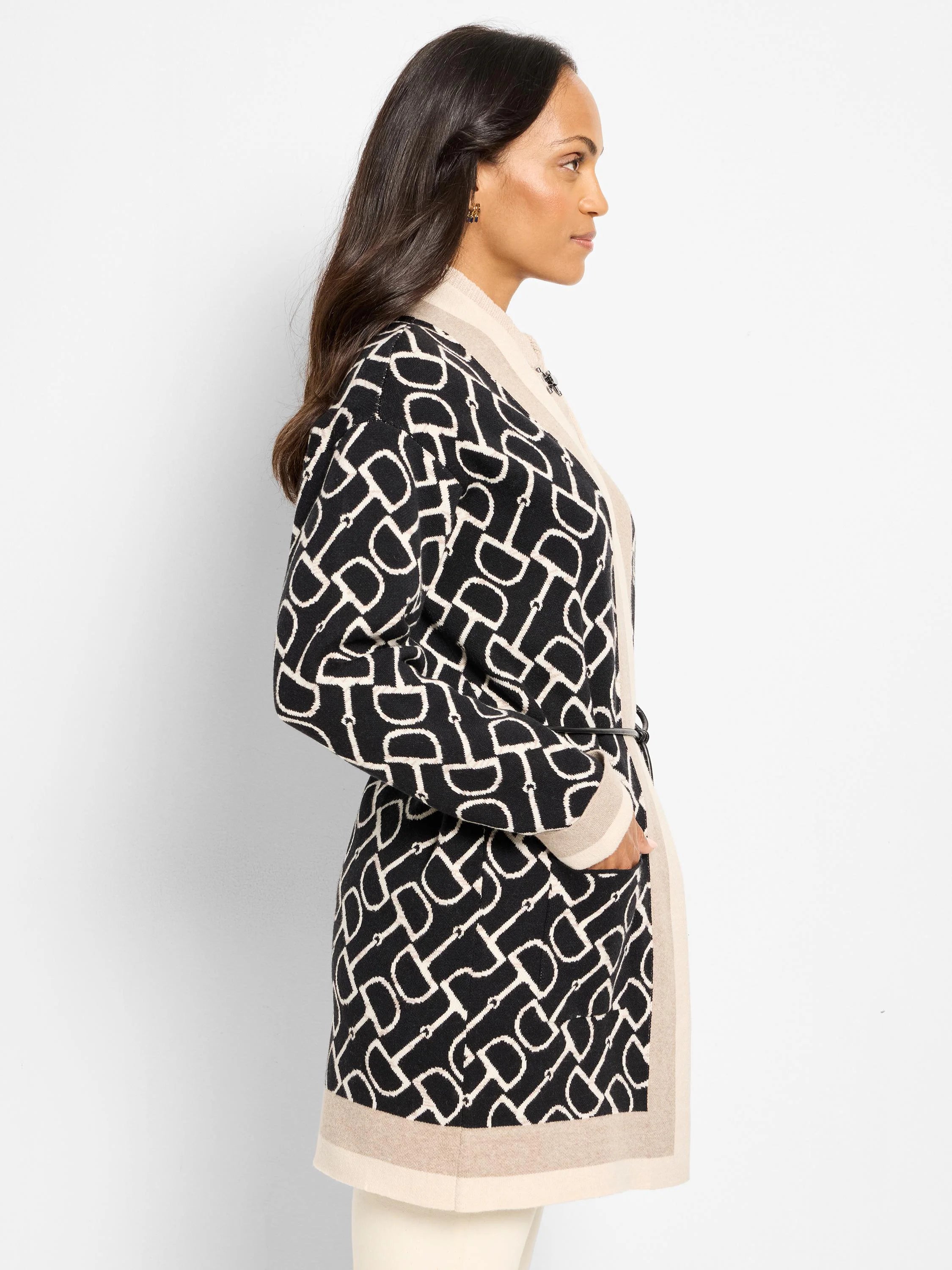 Long belted jacket with black & off-white equestrian pattern, beige trim.