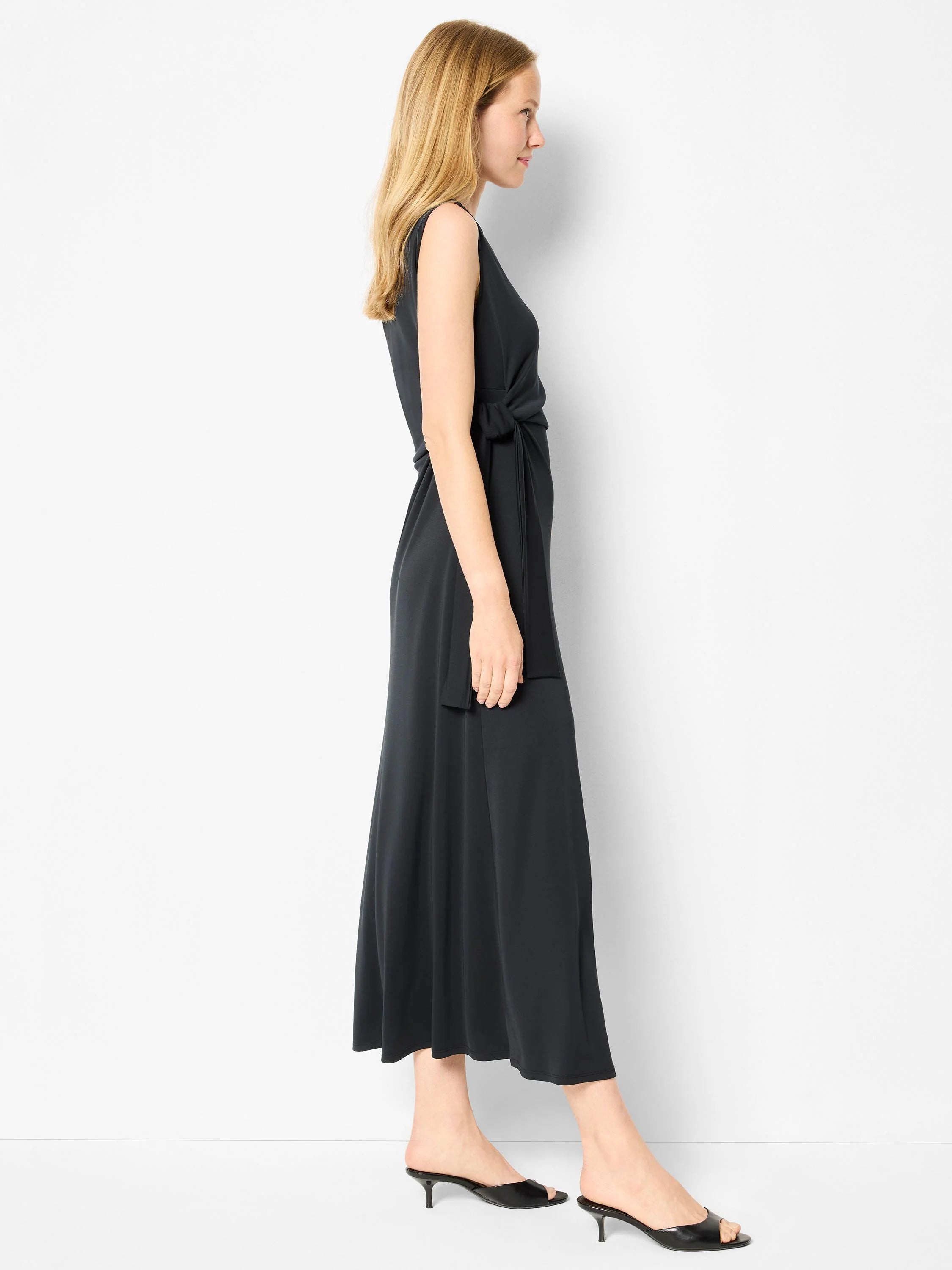 Dark gray midi dress; sleeveless, wrap style with self-tie belt. A-line skirt.