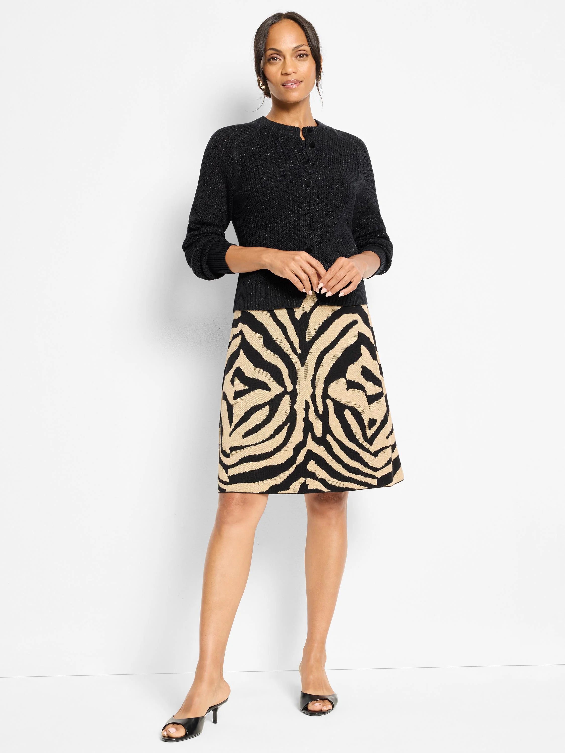 Black and tan zebra jacquard knit A-line skirt, falling above the knee.