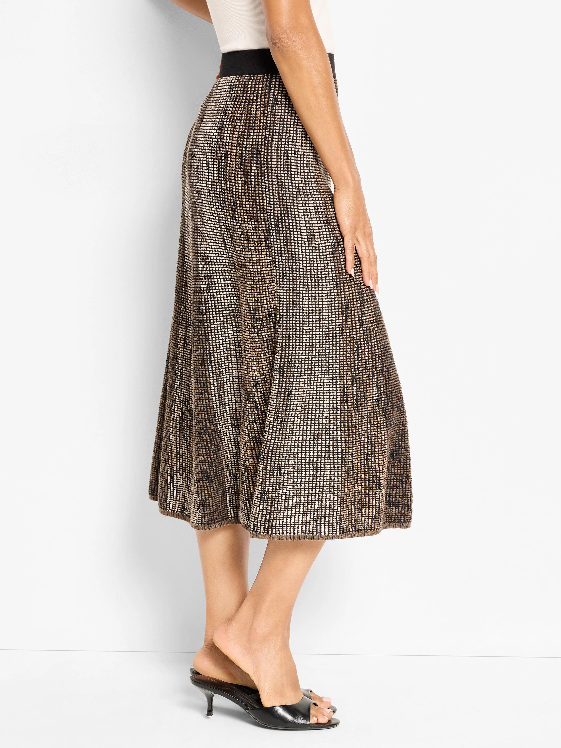 Knit midi skirt with ombre tan to black pixel pattern, A-line cut, black waistband.