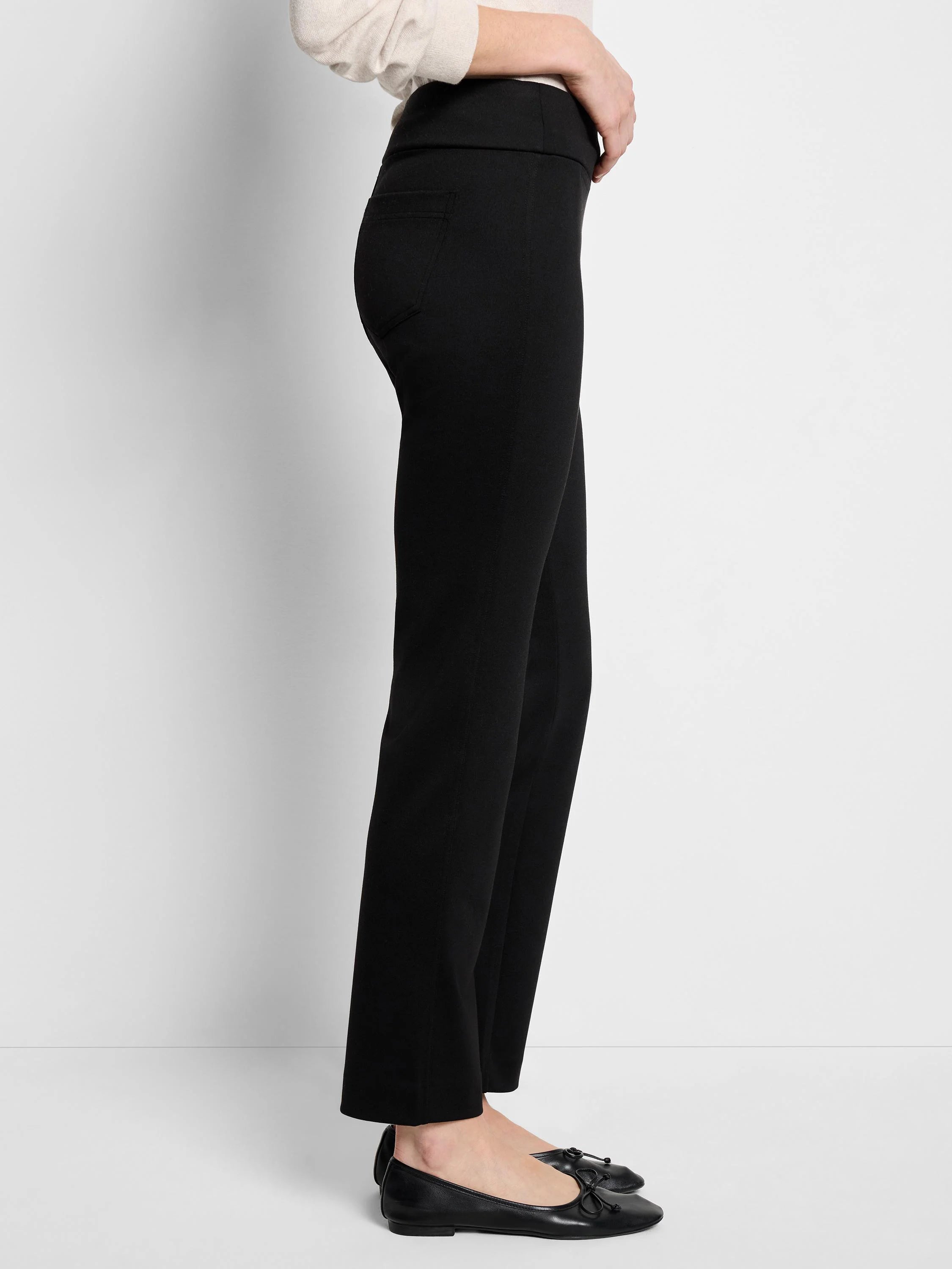 Black straight-leg pants;  pull-on waistband; side pockets.