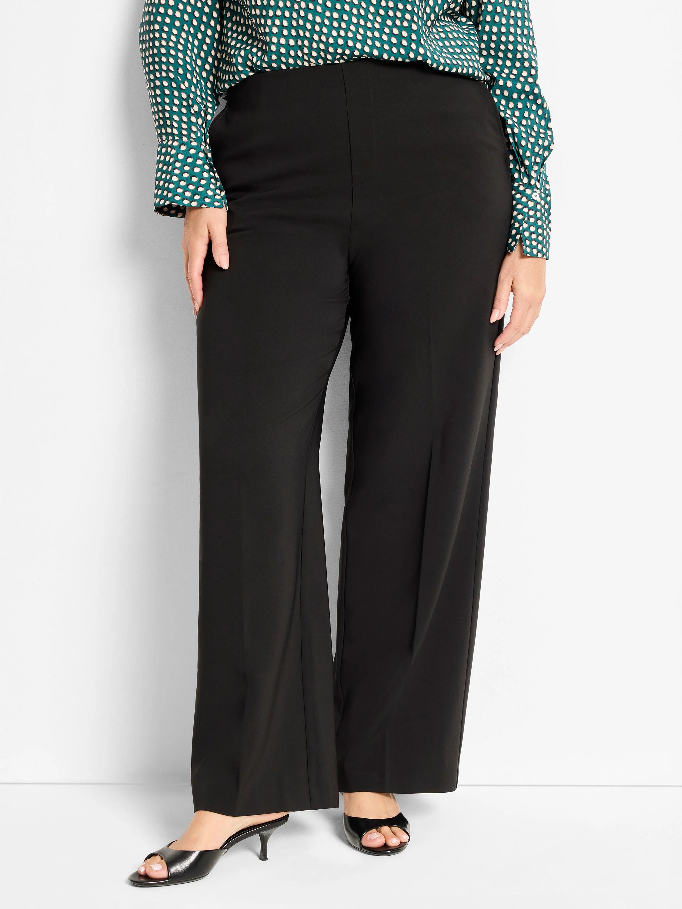Black wide-leg pants with a sleek, smooth finish. High-waisted design.