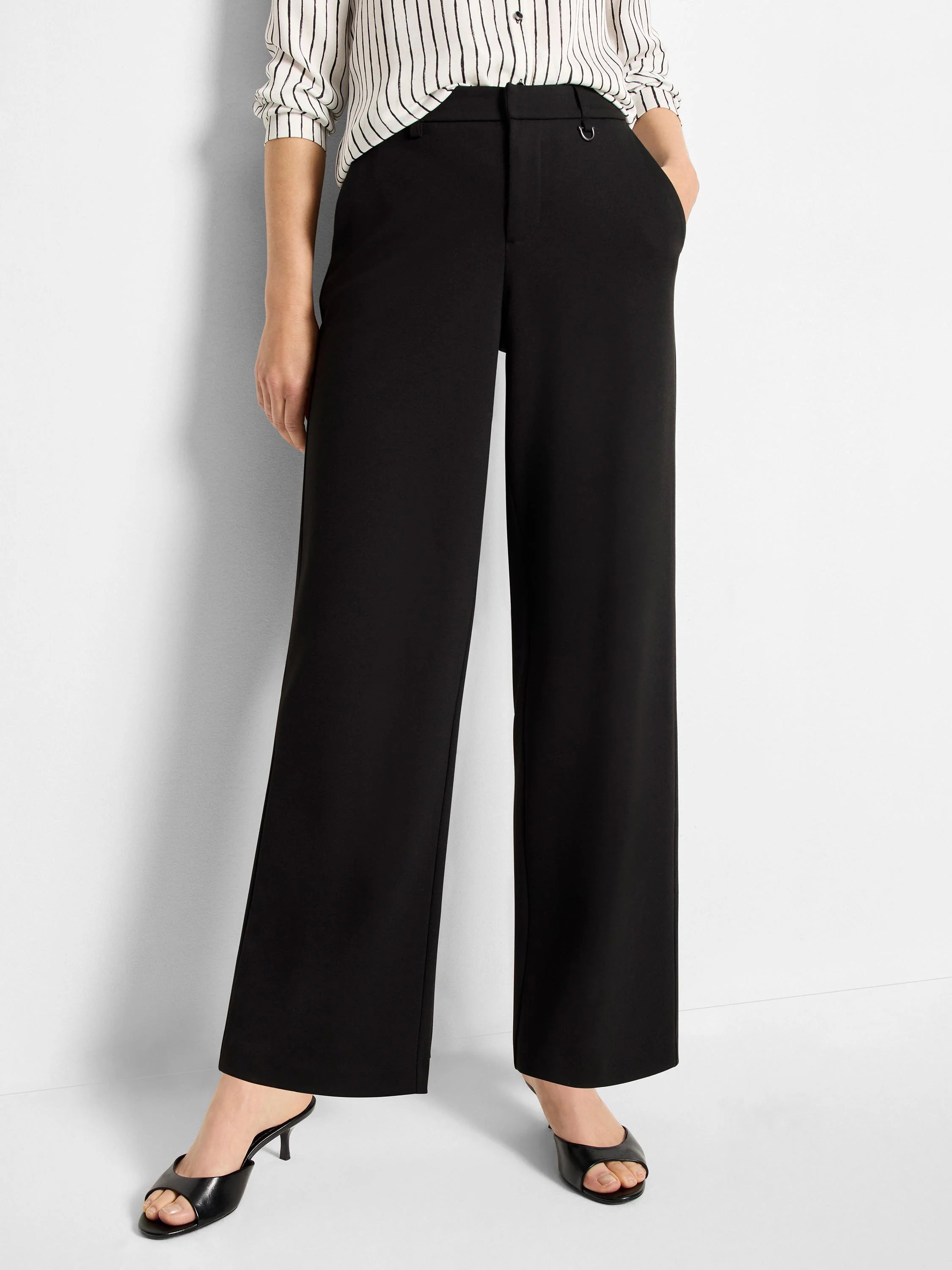 Black wide-leg pants with a subtle buckle detail at the waist. The pants are shown on a model.