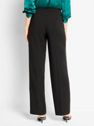 Black wide-leg tuxedo pants, high-waisted with a subtle side stripe, shown from behind.