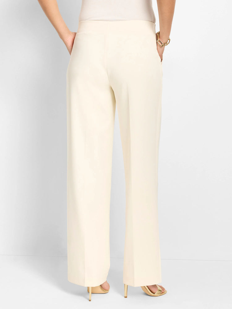Cream wide-leg pants, full-length, with a smooth, sleek fabric.