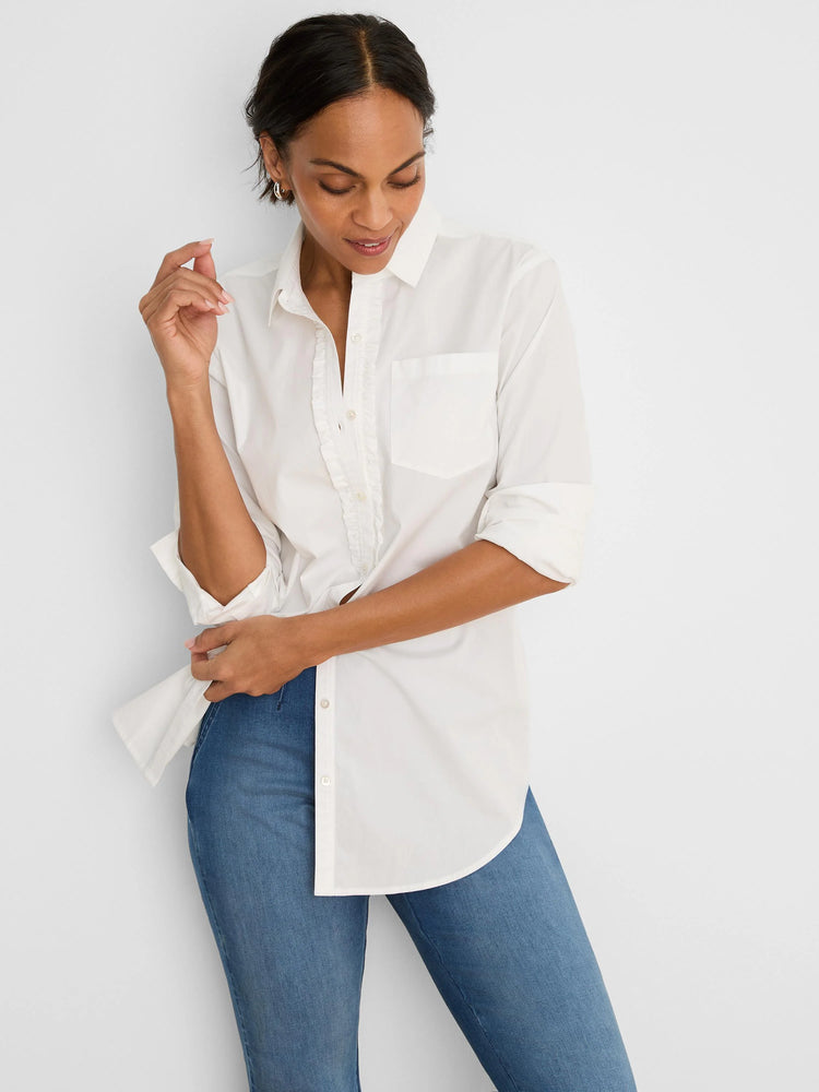 White button-down shirt with ruffle trim, chest pocket, and rolled sleeves.