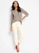 Beige & dark brown abstract falling dot chiffon top with ruffled stand collar & sheer long sleeves.