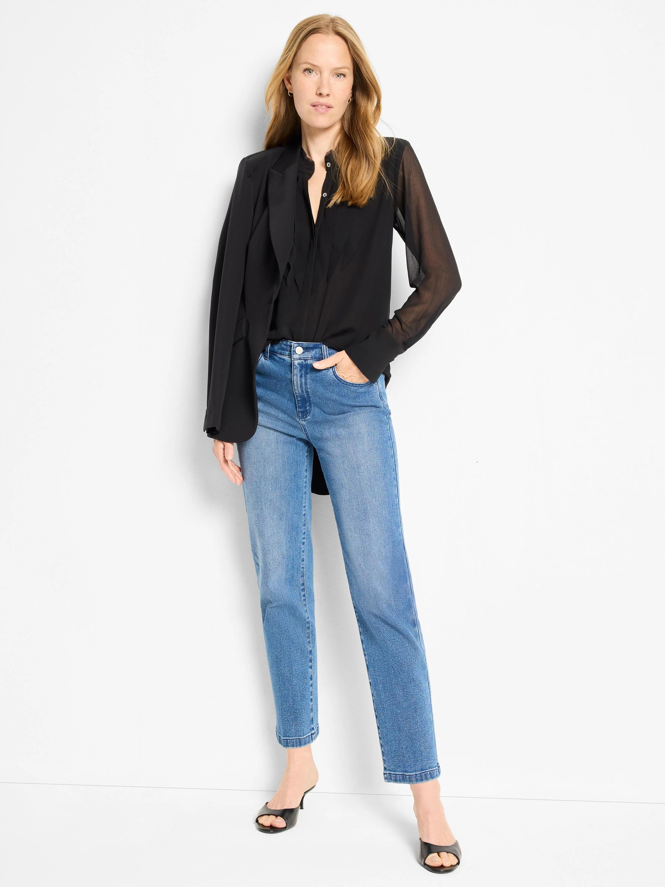 Black chiffon long-sleeve top with sheer sleeves and a button-front.