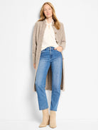 Off-white chiffon long-sleeve top with a ruffled stand collar and partial button placket.