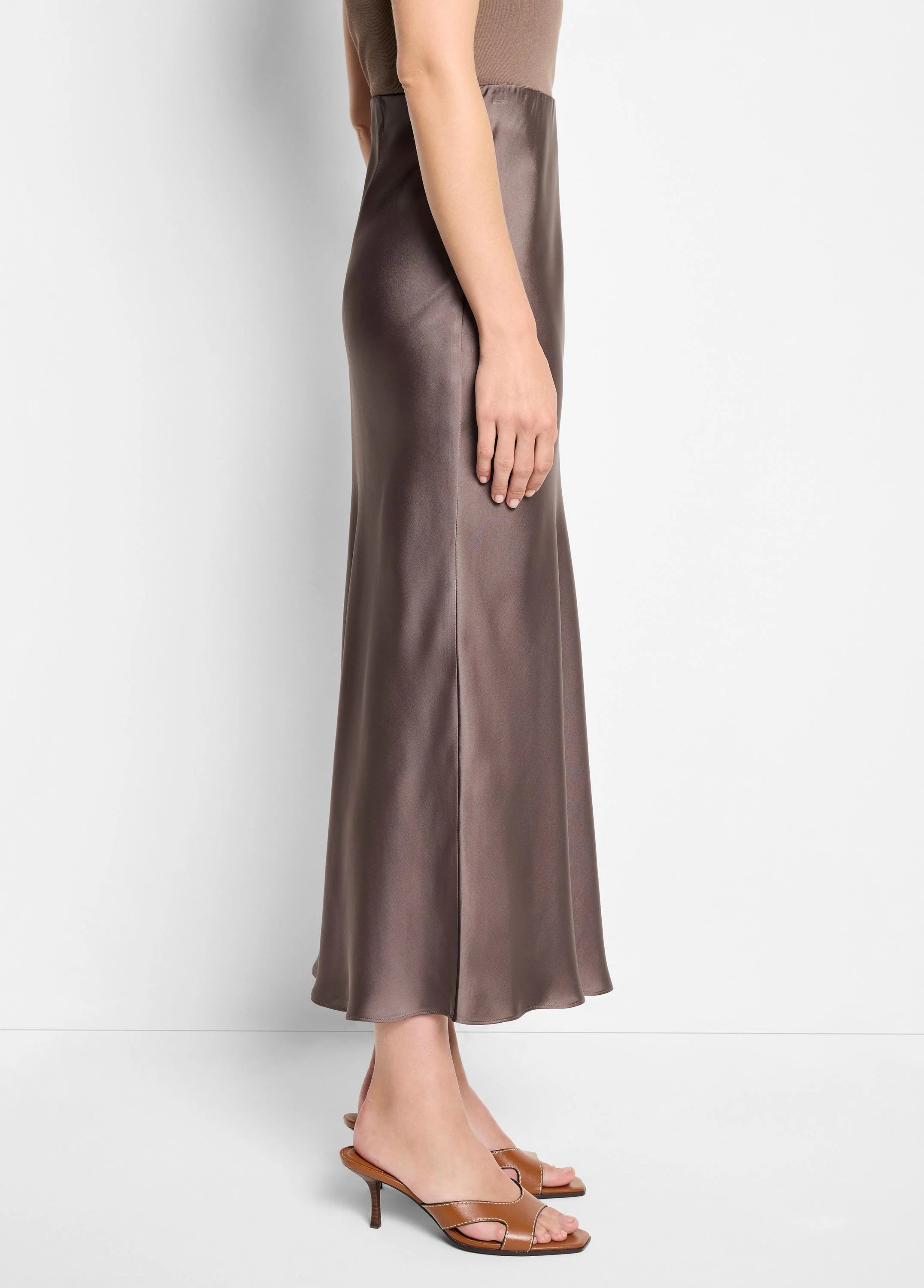 A glossy taupe slip skirt, ankle-length, with a smooth, flowing fit.