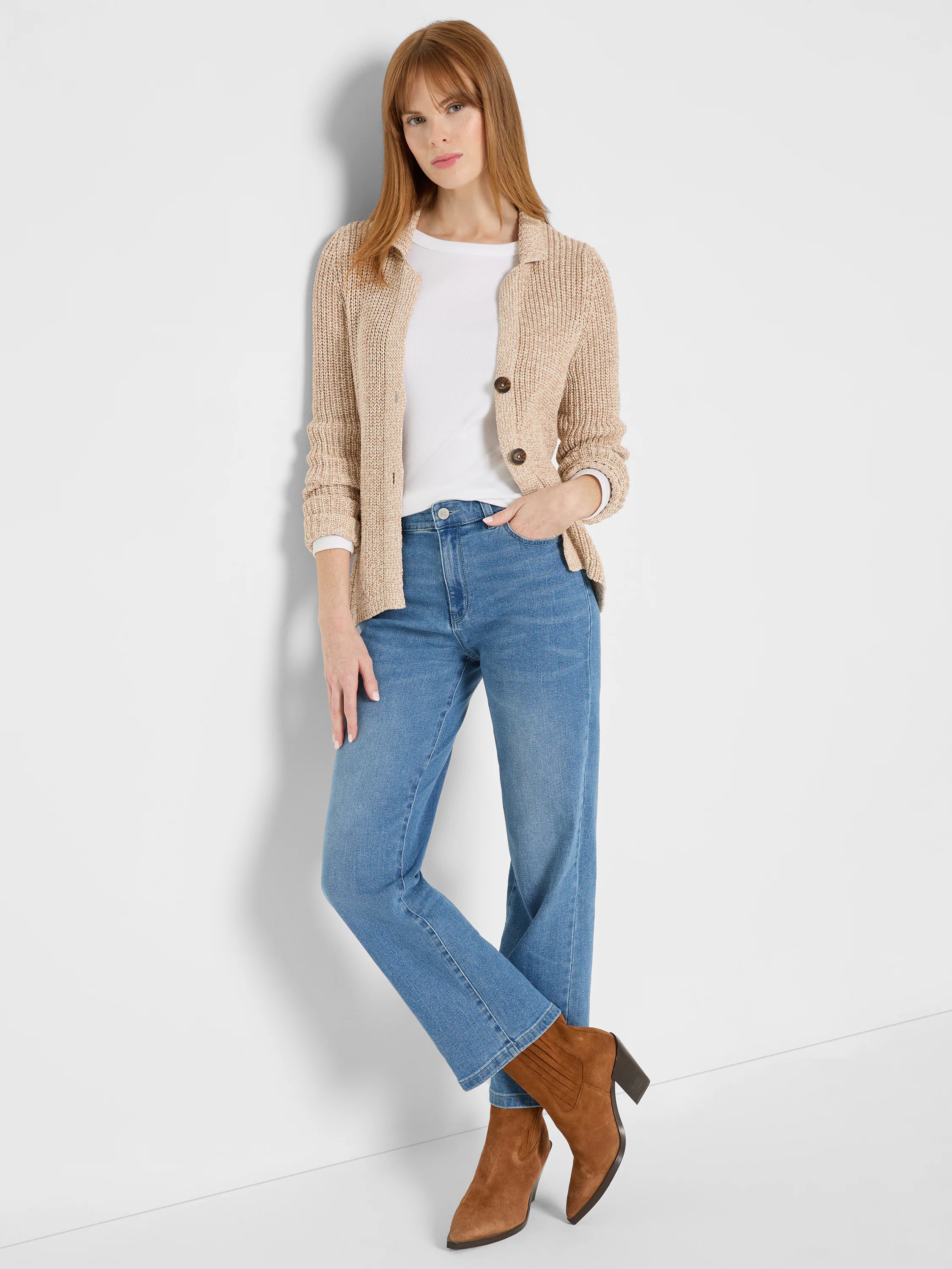 Light blue, high-rise straight ankle jeans. Subtle fading on thighs. Classic denim look.