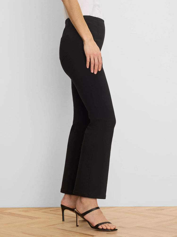 Black bootcut pants, fitted from a high waist through the thigh, with a slight flare at the ankle. Full length.