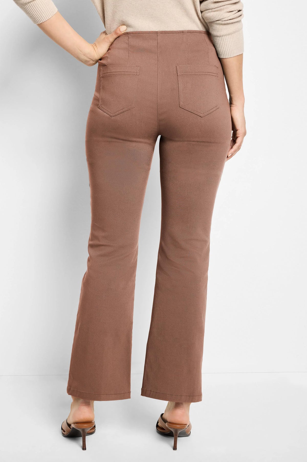 Mocha brown bootcut pants, high-waisted, shown from the back with two patch pockets.