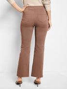 Mocha brown bootcut pants, high-waisted, shown from the back with two patch pockets.
