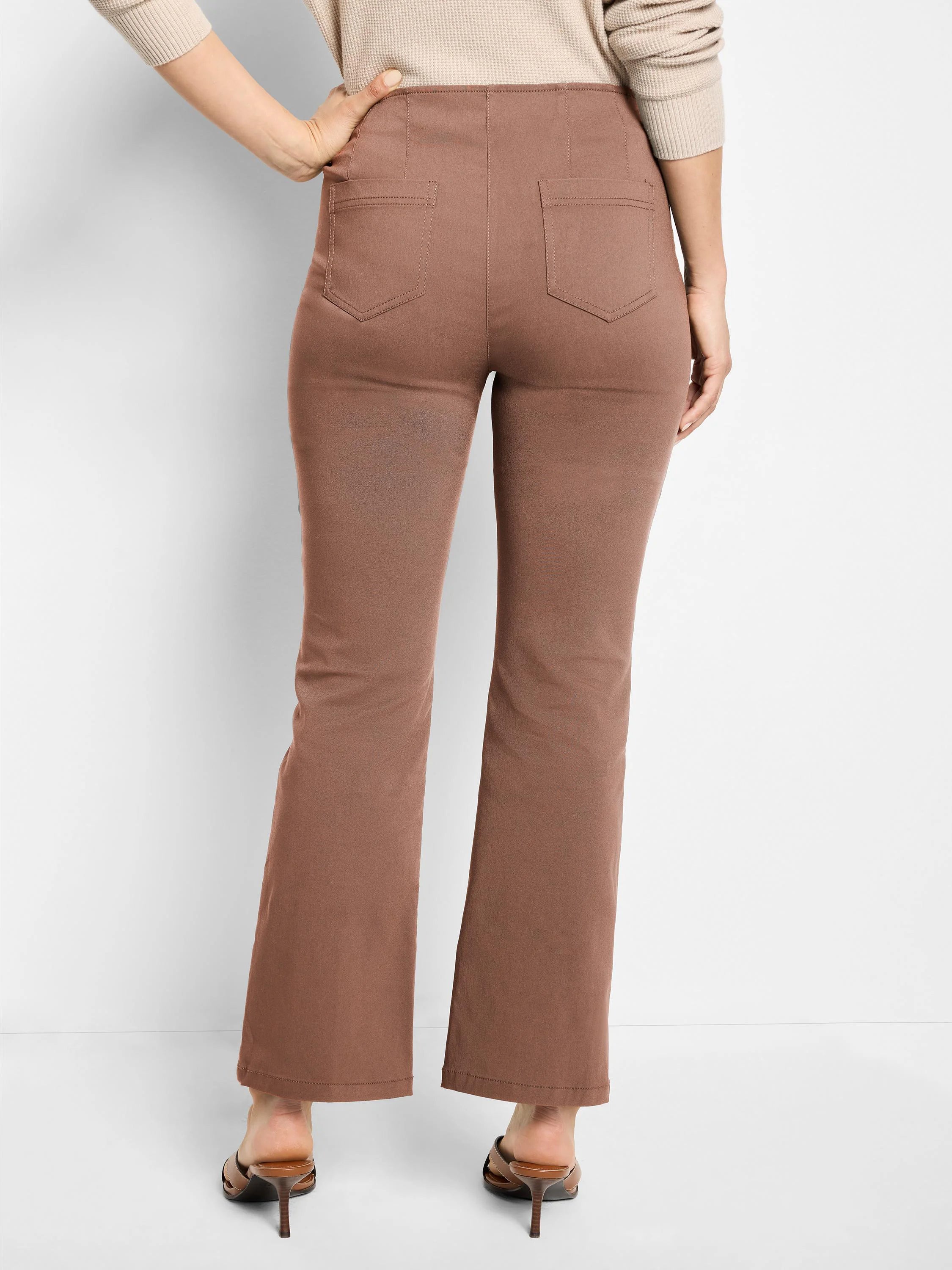 Mocha brown bootcut pants, high-waisted, shown from the back with two patch pockets.
