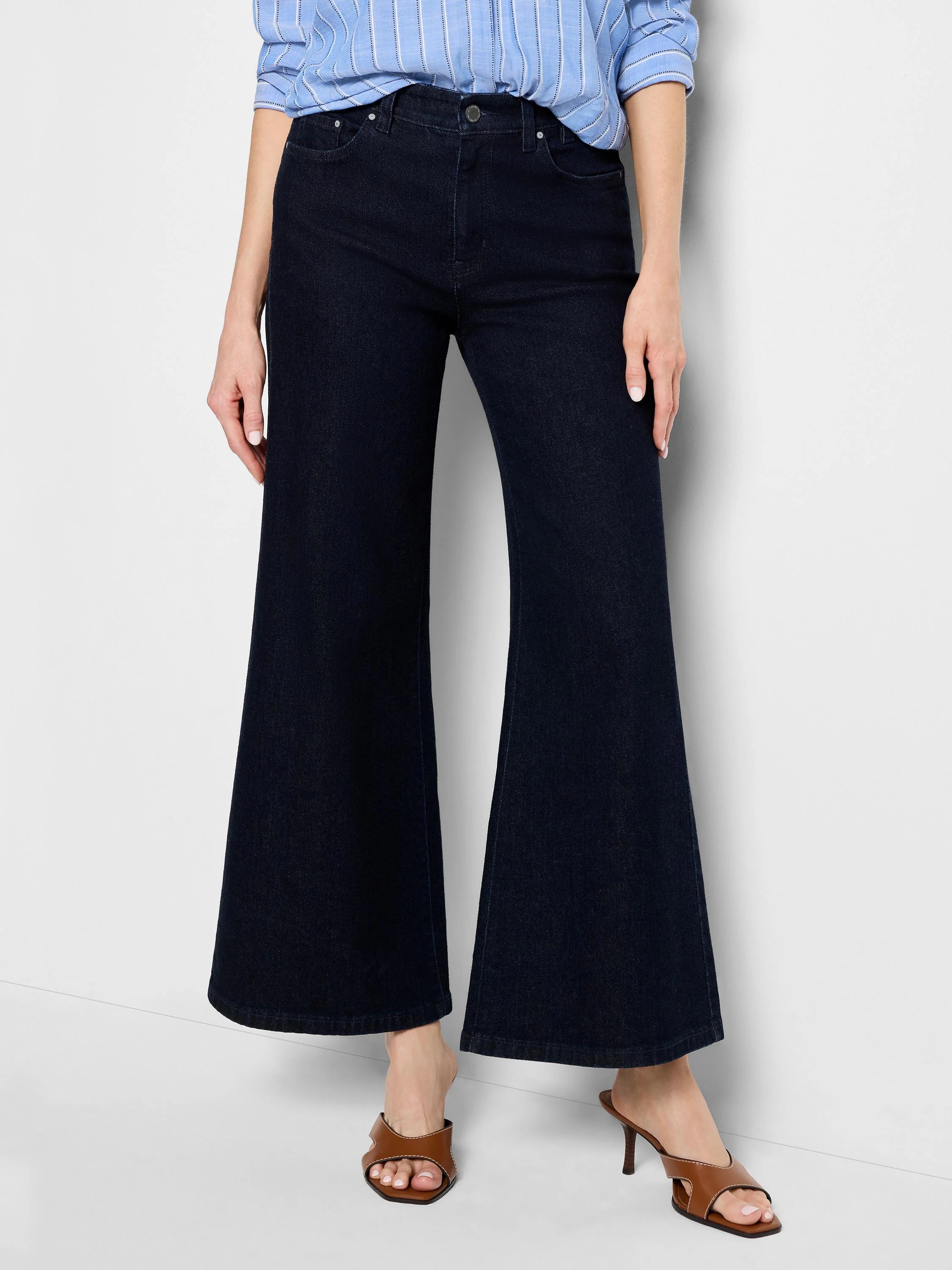 Dark indigo, high-waisted boot flare jeans with a wide leg.