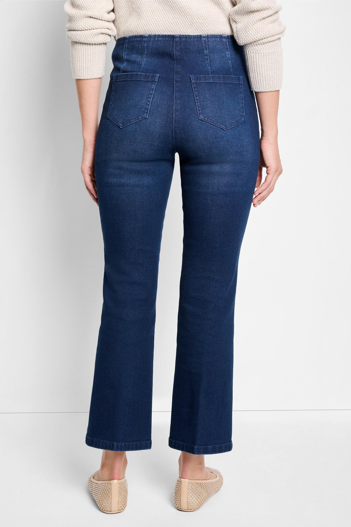 Dark wash, bootcut jeans; back view shows two back pockets.