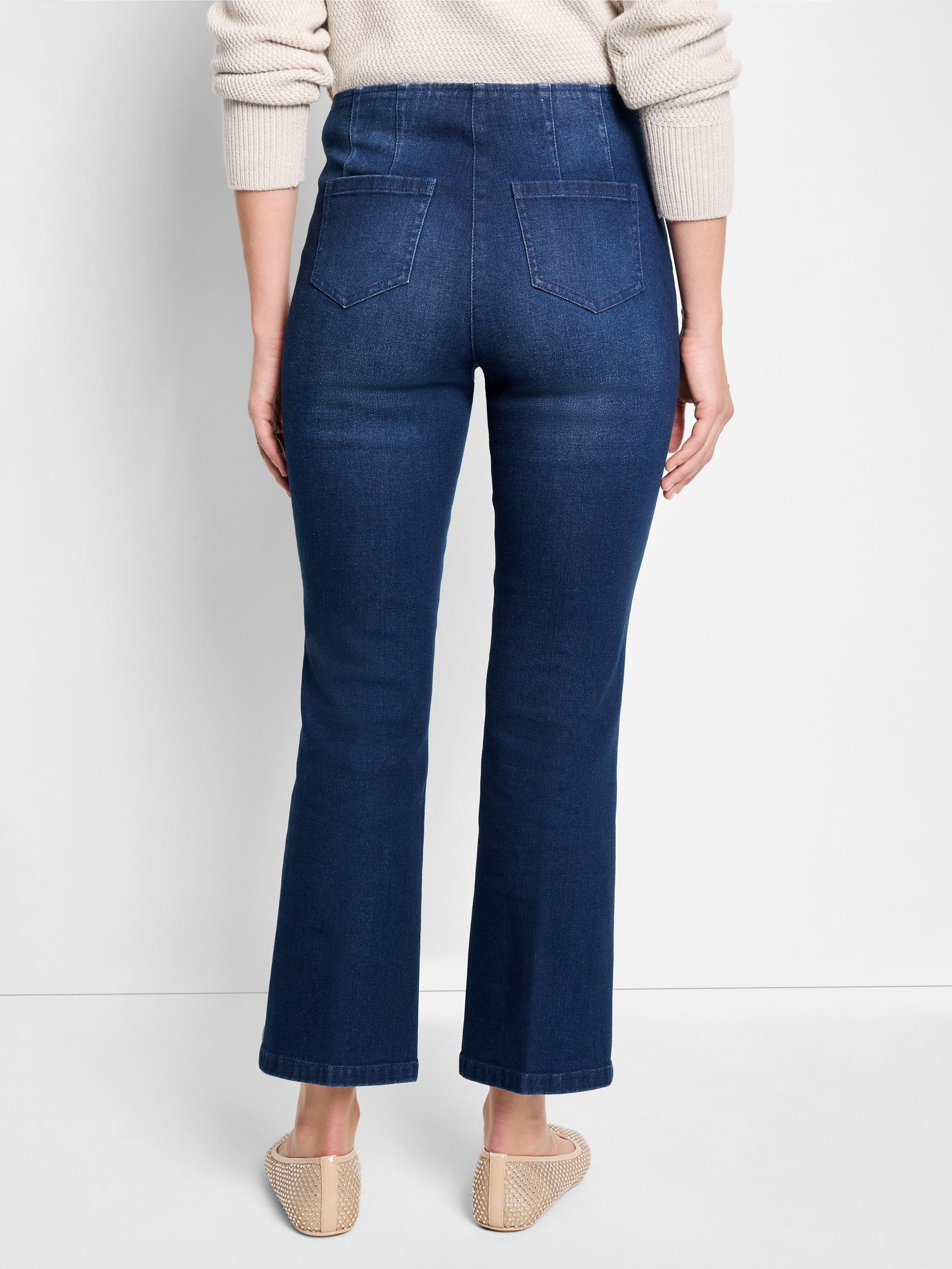 Dark wash, bootcut jeans; back view shows two back pockets.