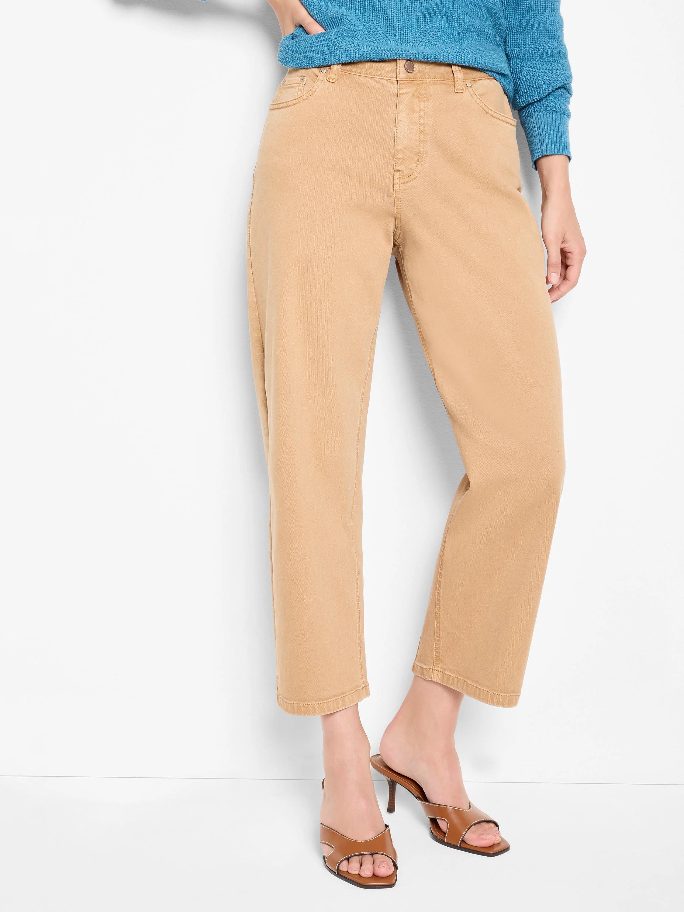 Tan barrel leg jeans, cropped at the ankle, with standard front pockets and a subtle faded look.