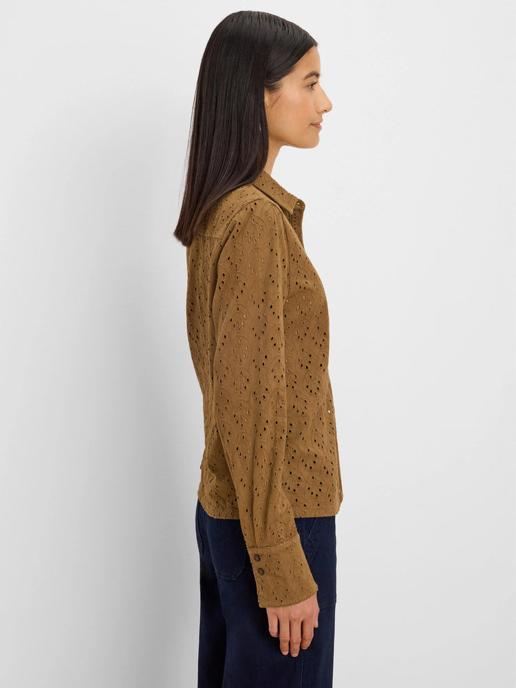 Camel collared top with long sleeves, button cuffs, and all-over eyelet cutouts in delicate leaf patterns.