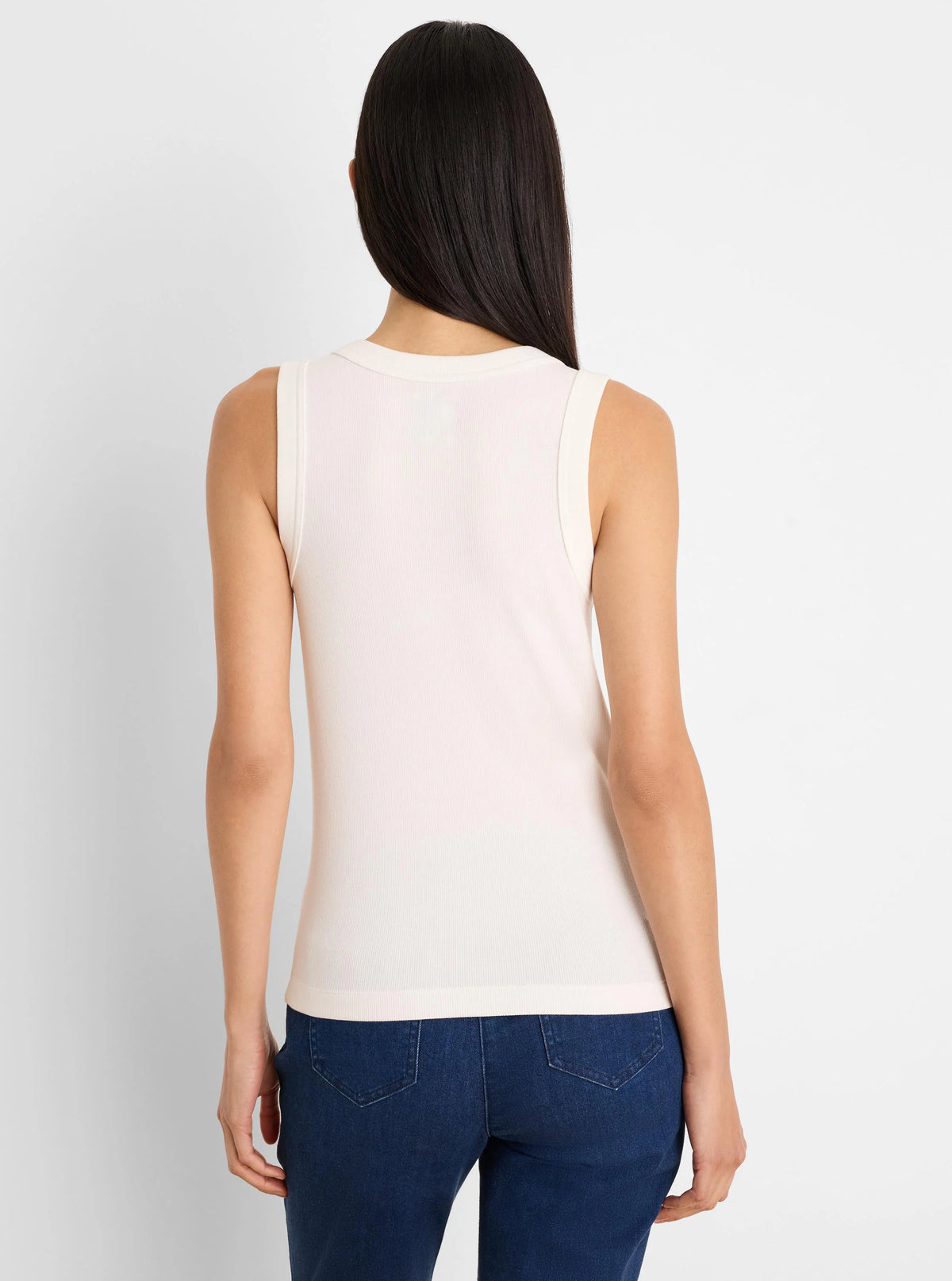 Cream ribbed knit tank top, back view. Sleeveless with a high round back neckline.
