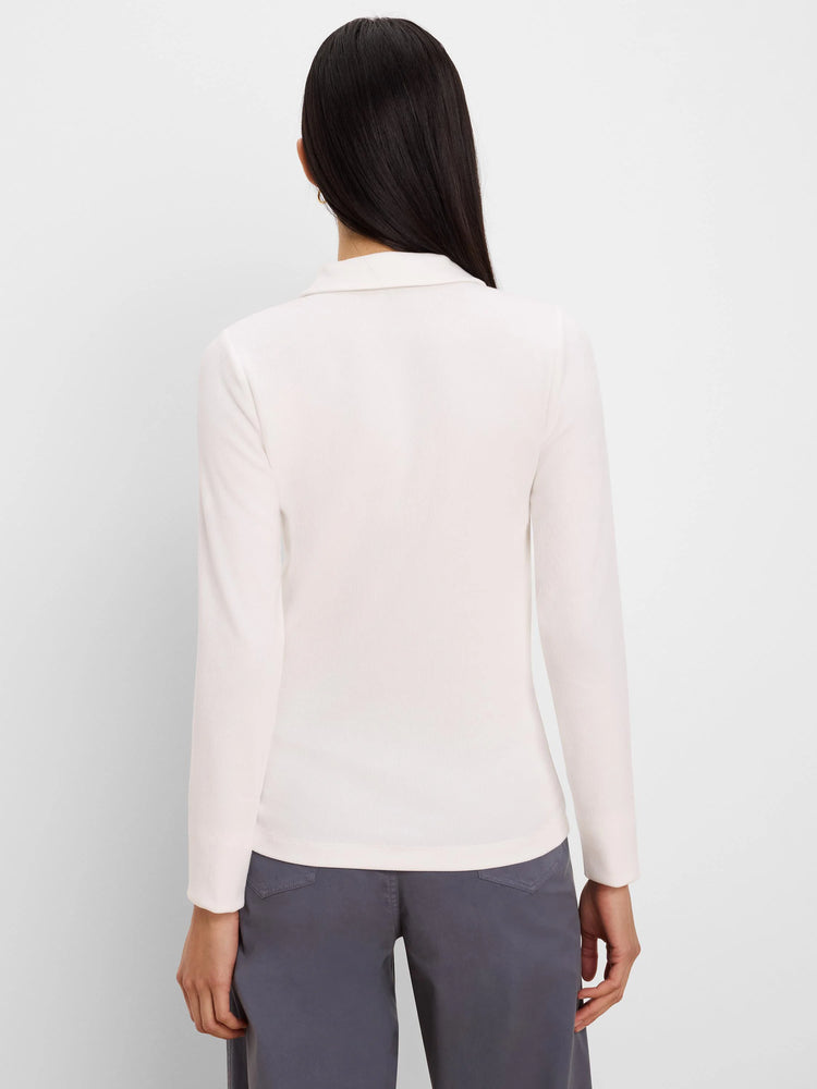Off-white long-sleeve ribbed knit polo shirt, back view.
