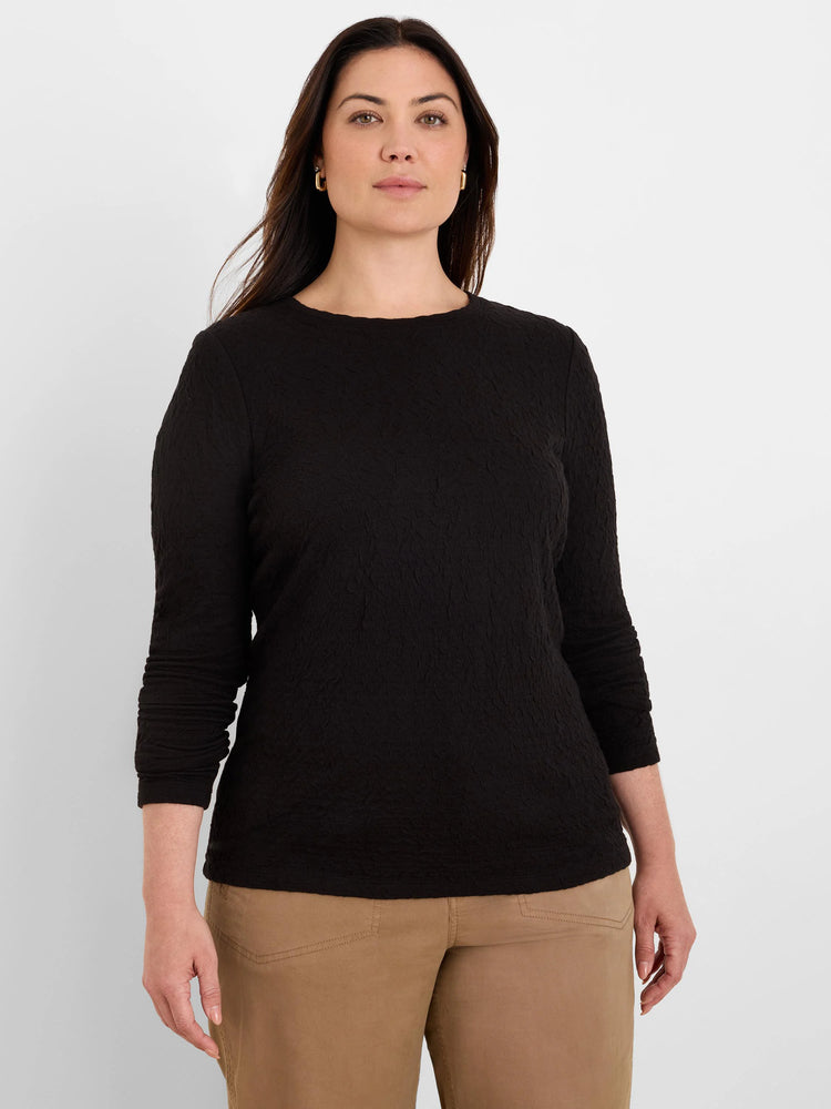 Black top with a crinkle knit texture, round neck, and 3/4 length sleeves.