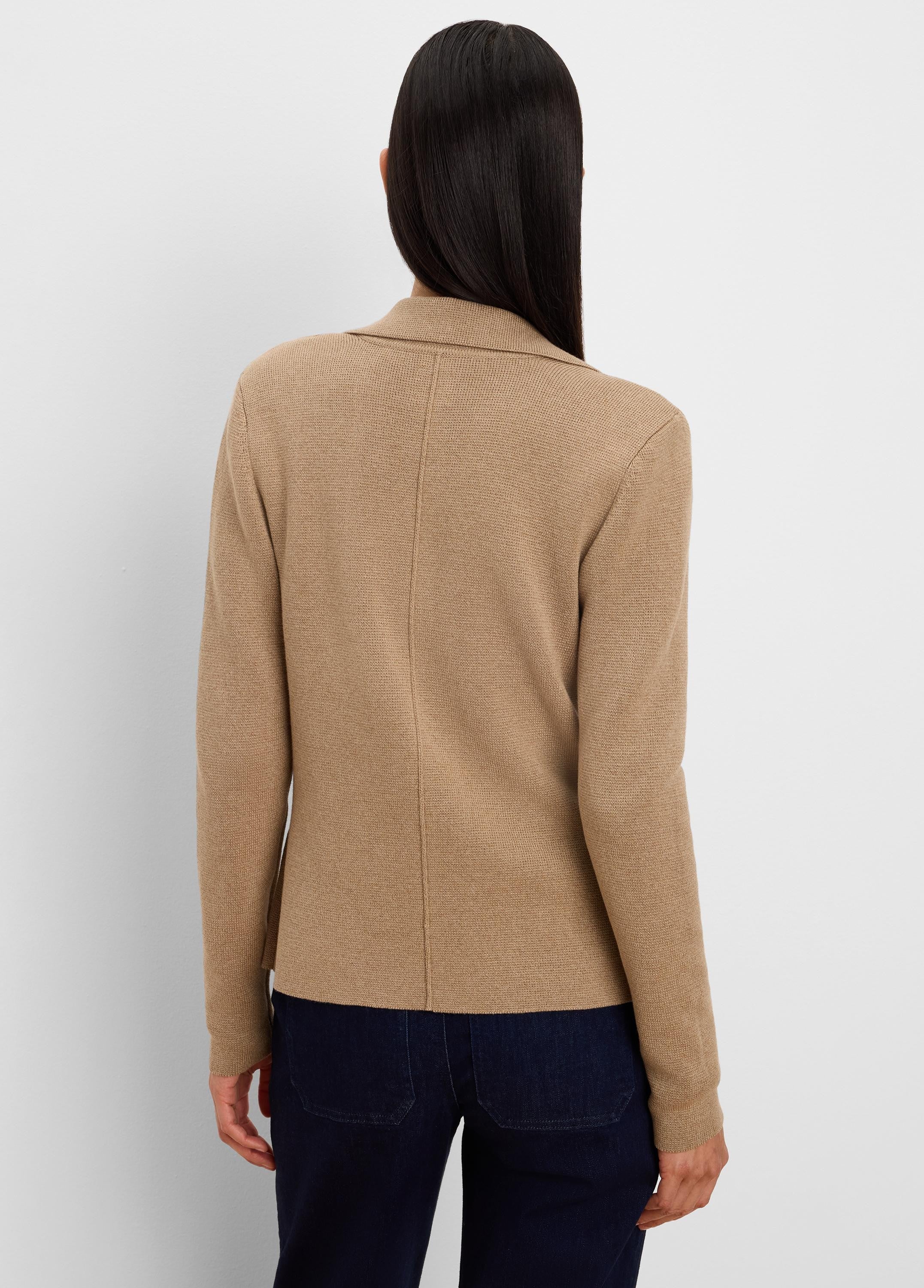 Camel knit tailored blazer, back view. Features visible knit texture and a central back seam.