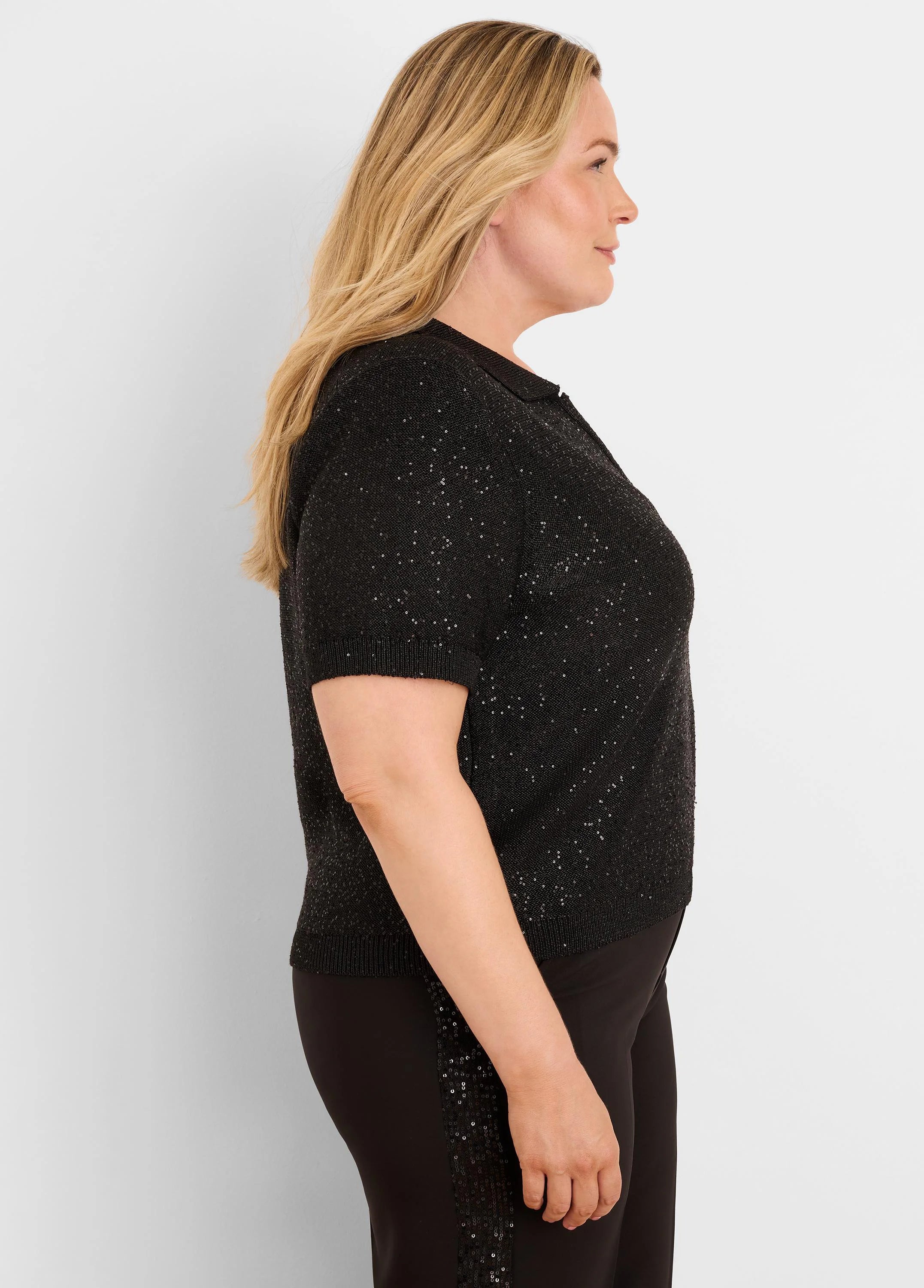 Black short-sleeve polo sweater, covered in small, reflective black sequins.