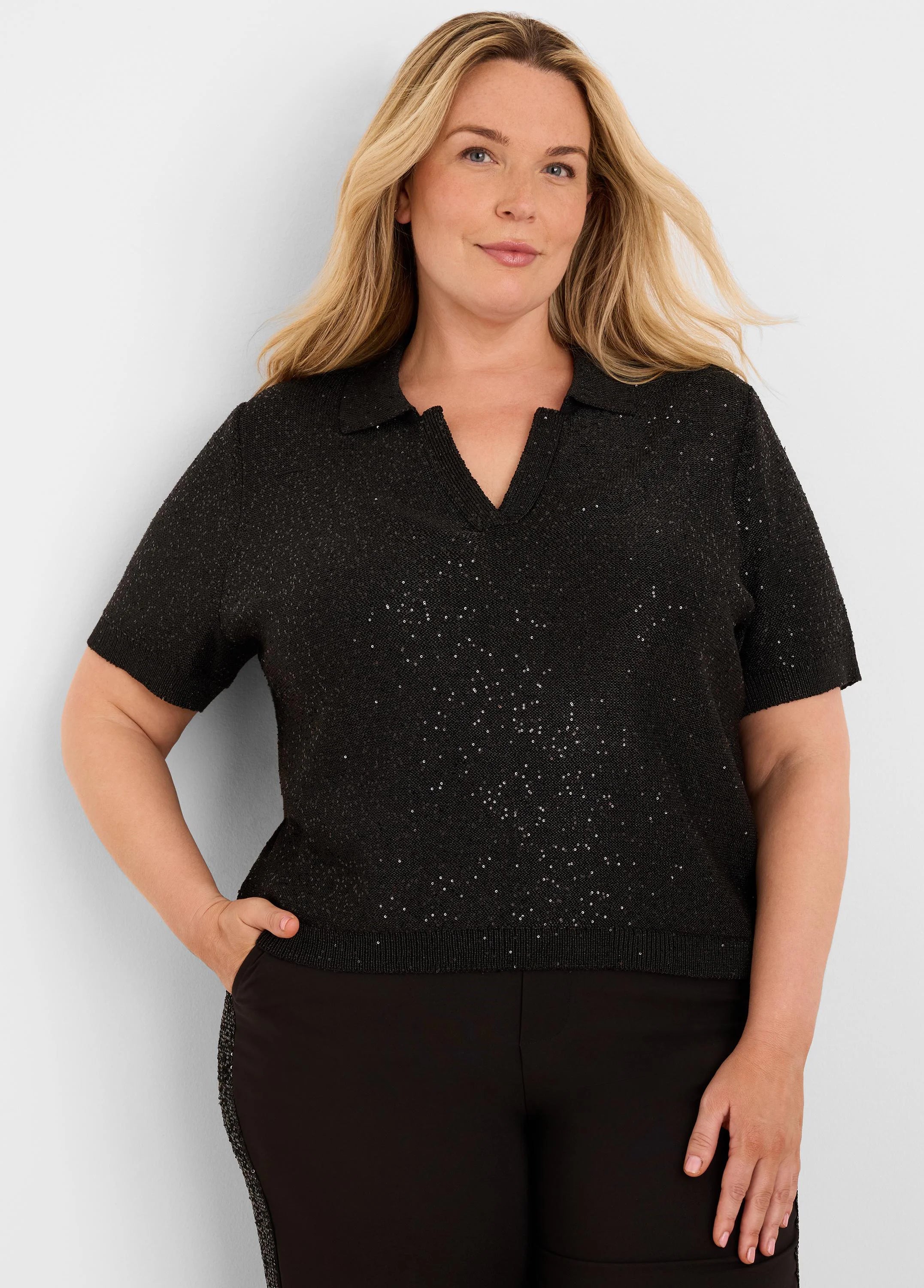 Black short-sleeve sequin sweater with polo collar and V-neck.