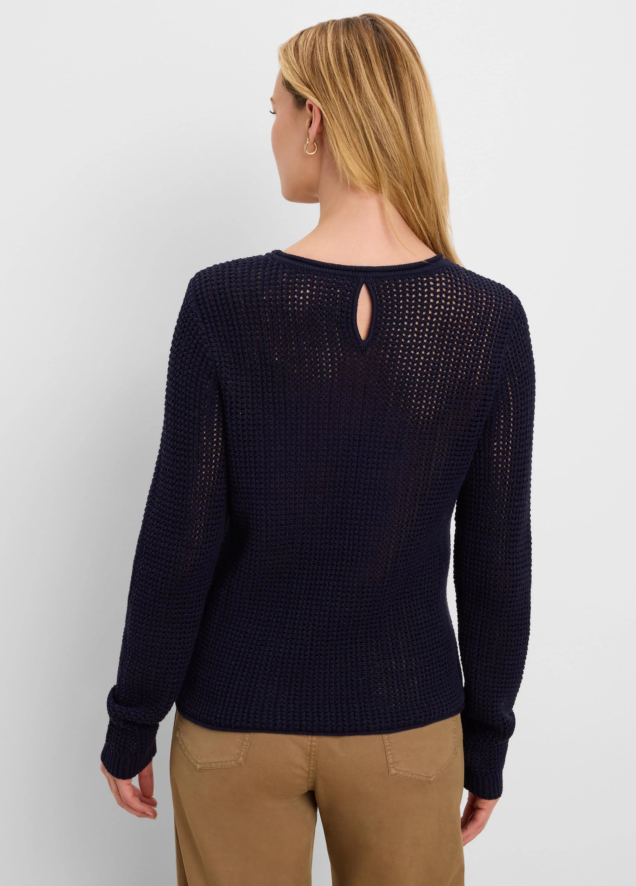 Dark navy blue long-sleeve sweater with mixed diamond stitch knit texture and a keyhole cutout on the upper back.