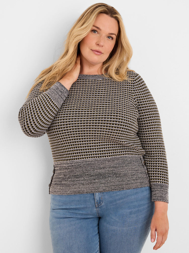 Marled grey crew neck sweater with a textured grid pattern in black, light grey, and yellow; solid grey lower hem.