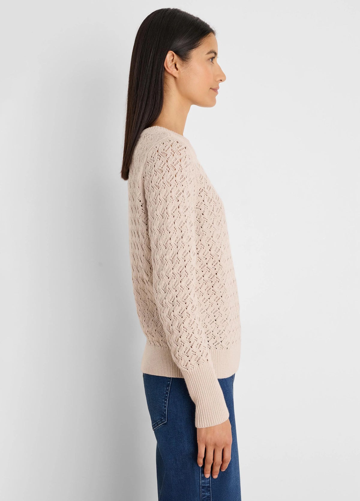 Pale beige open-knit sweater with a delicate diamond pattern, ribbed cuffs and hem.