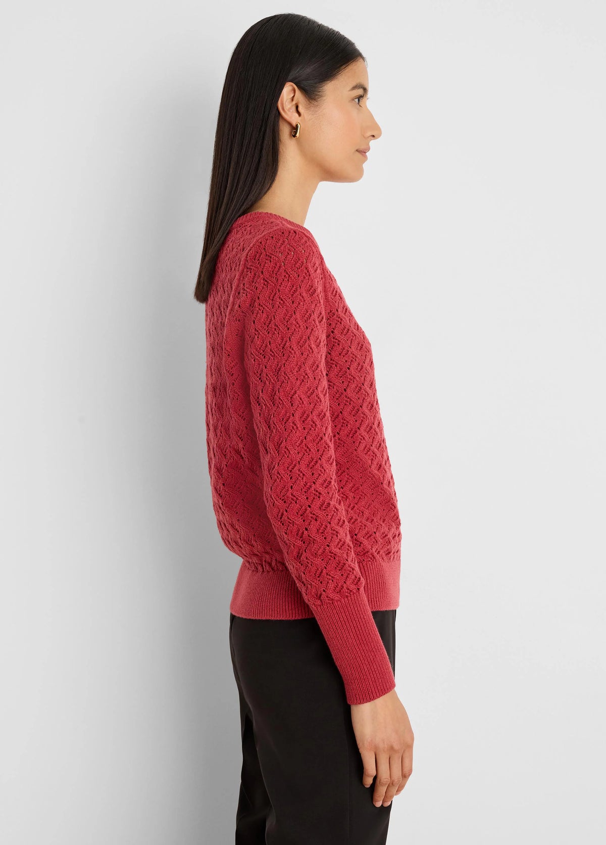 Sterling Stitch Sweater: Reddish-pink with an all-over openwork diamond knit pattern, ribbed cuffs & hem.