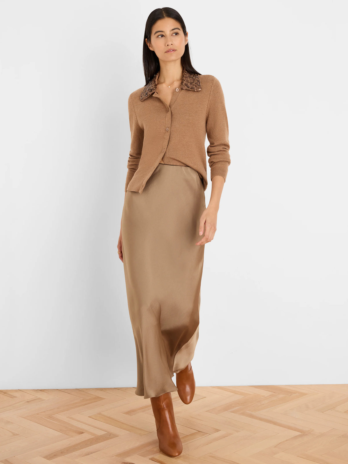 Camel cardigan with a dark brown sequin collar.