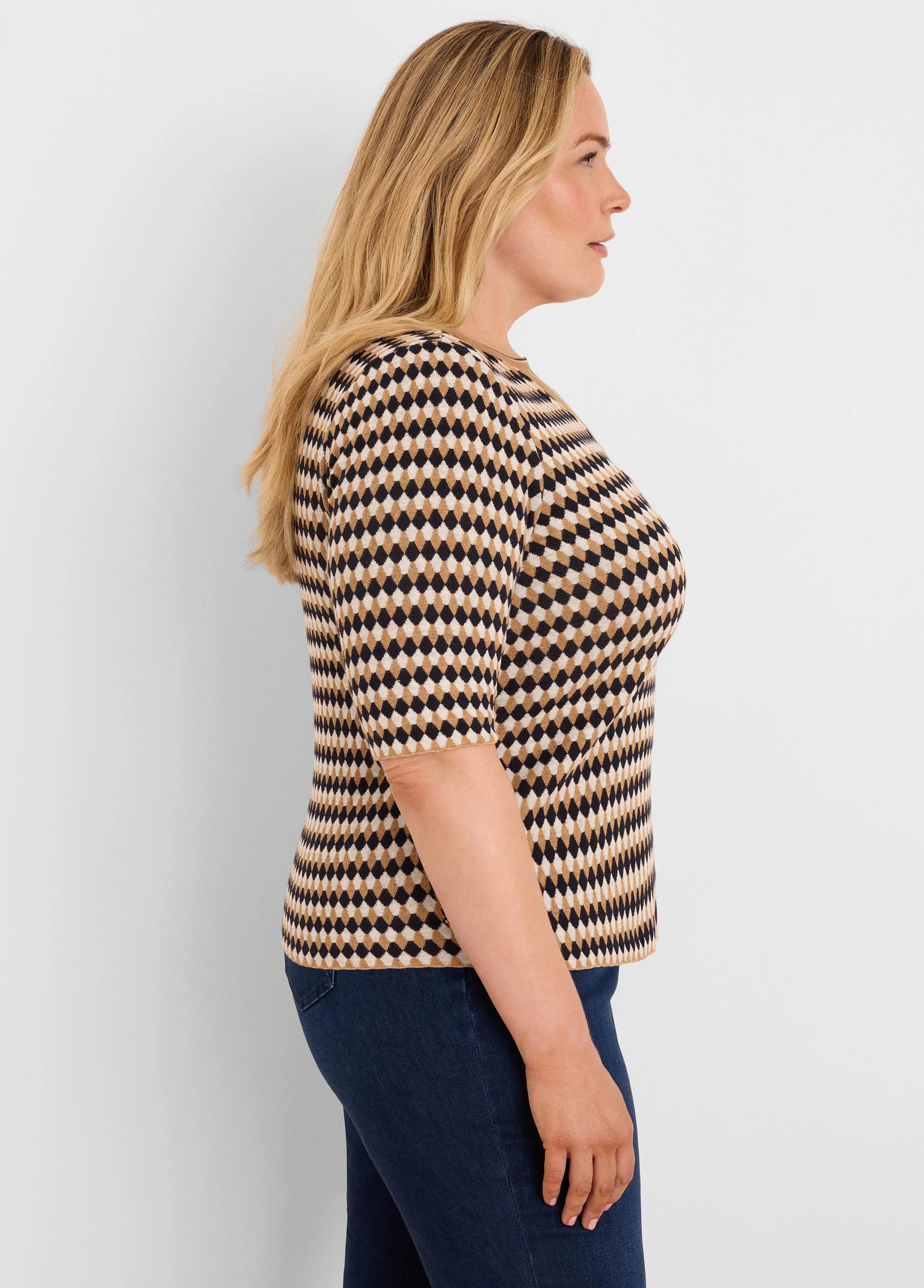 Cream, tan, and black angled diamond jacquard sweater with 3/4 sleeves.