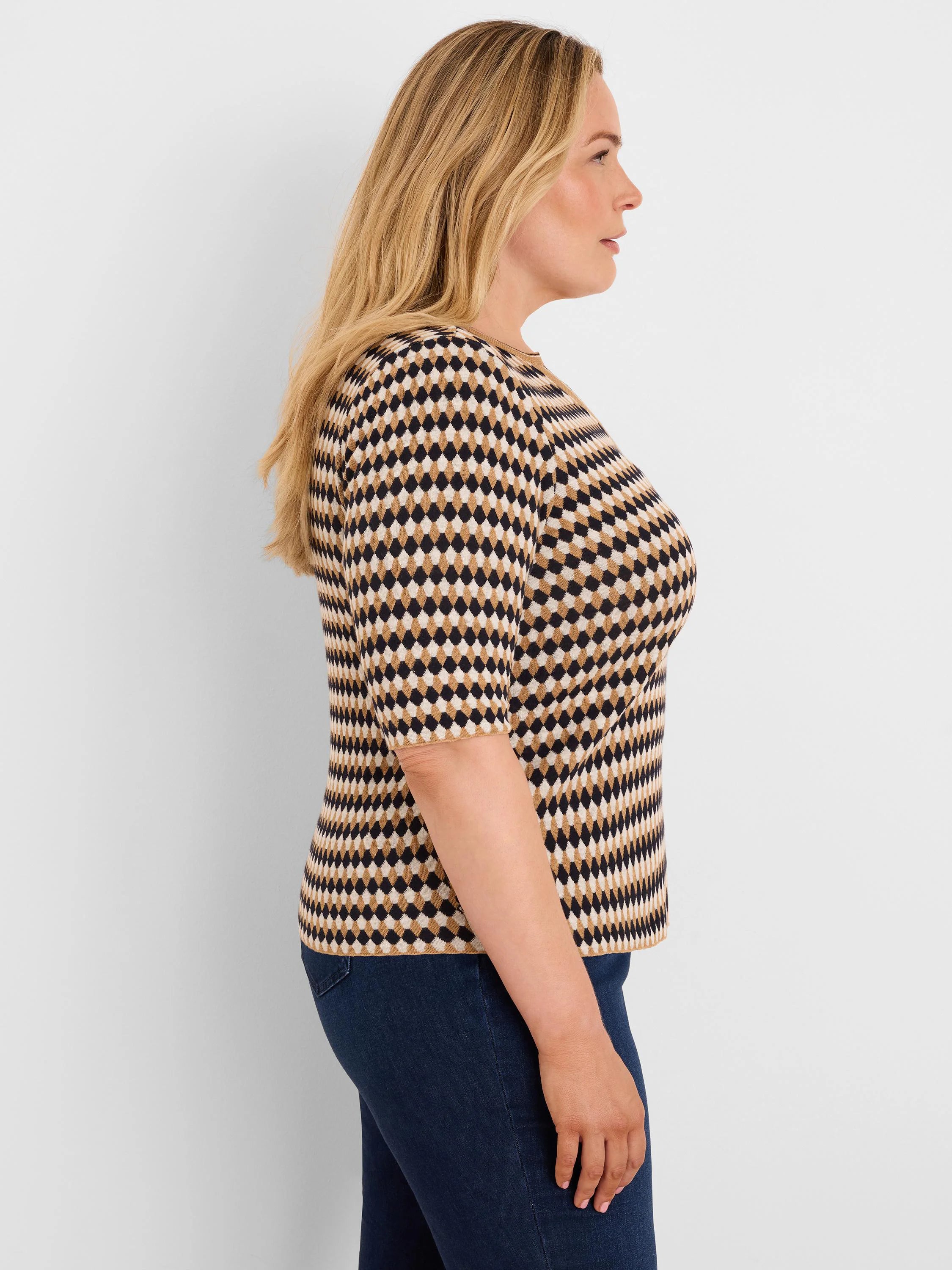 Cream, tan, and black angled diamond jacquard sweater with 3/4 sleeves.