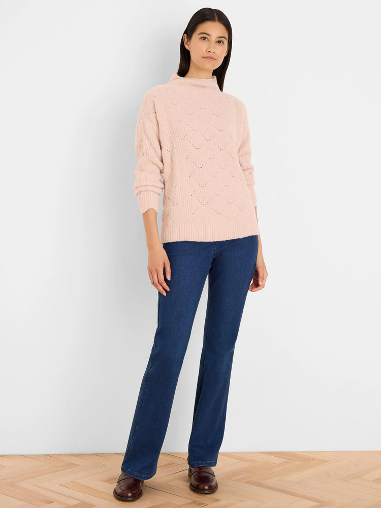 Pale pink, fuzzy mock neck sweater with a diamond knit pattern.