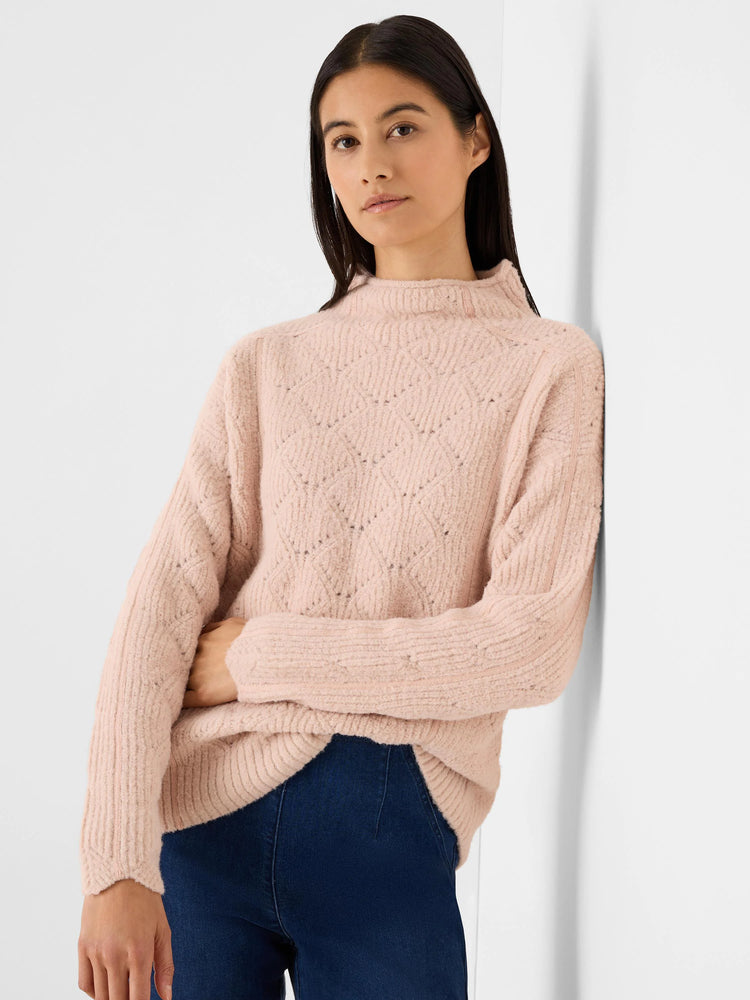 Light pink fuzzy mock neck sweater with diamond knit pattern and ribbed cuffs.