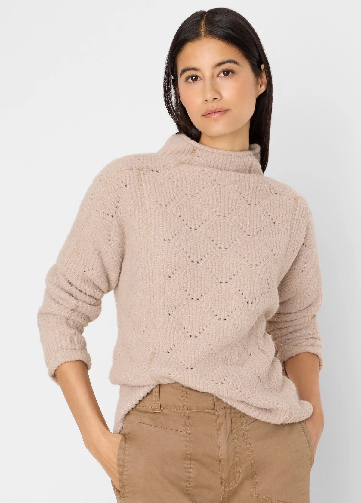 Pale beige fuzzy mock neck sweater with open-work diamond knit pattern.