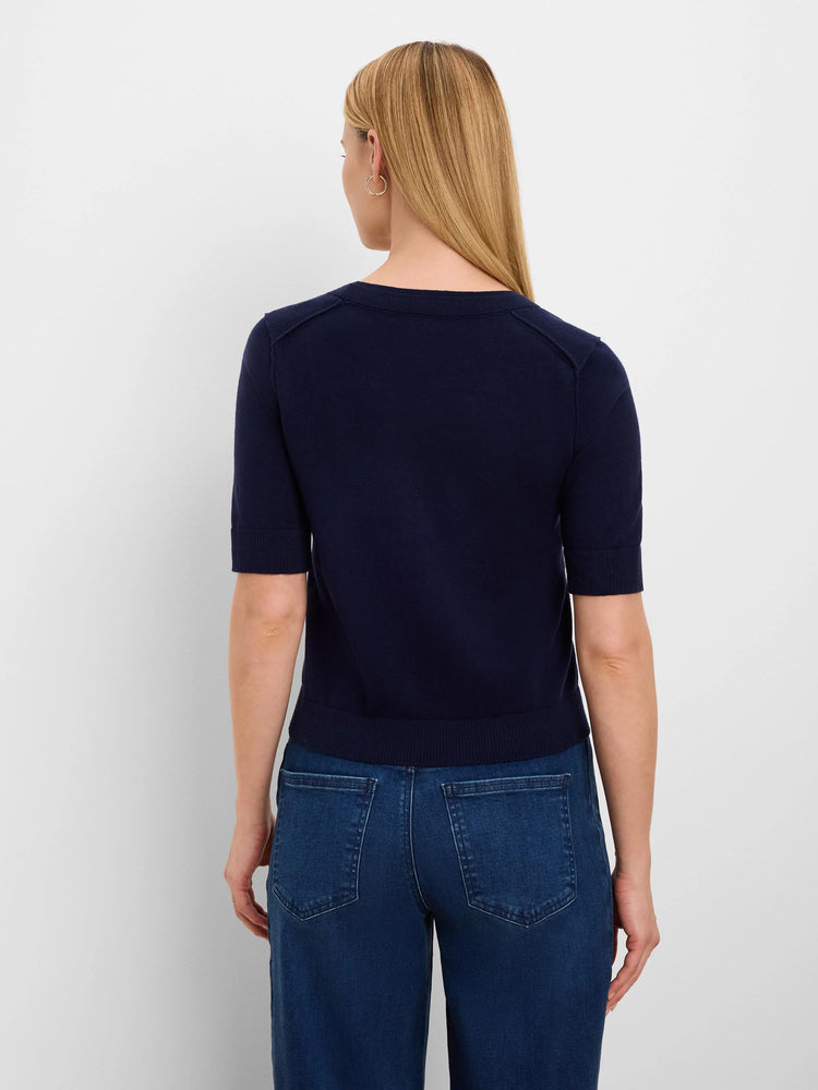 Navy short-sleeve sweater tee, back view. Features ribbed crew neck, sleeve cuffs, hem, and shoulder seam details.