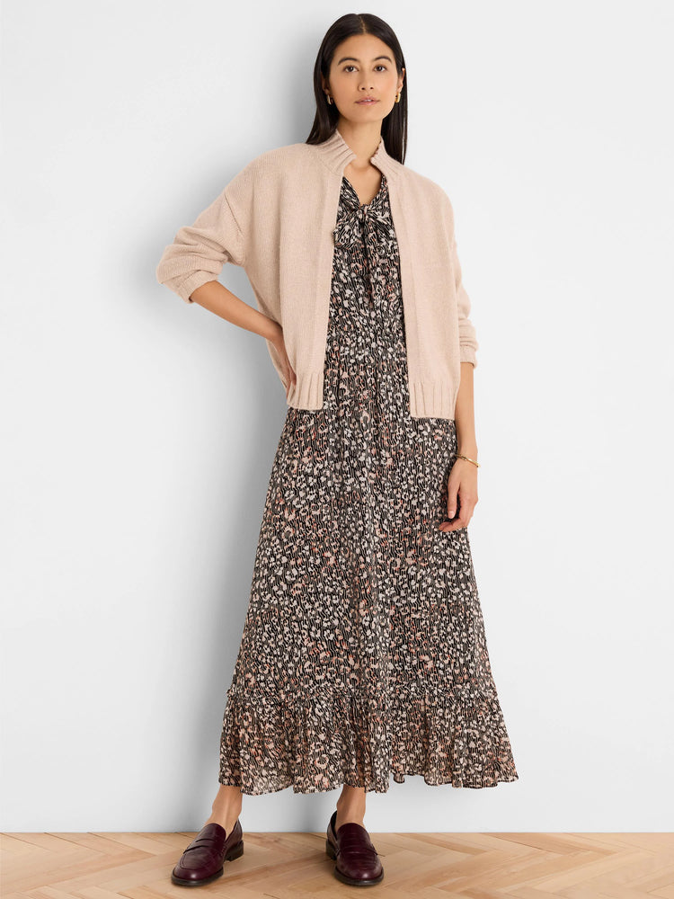 Blush pink open-front knit cardigan, short length, with a ribbed mock neck and cuffs.