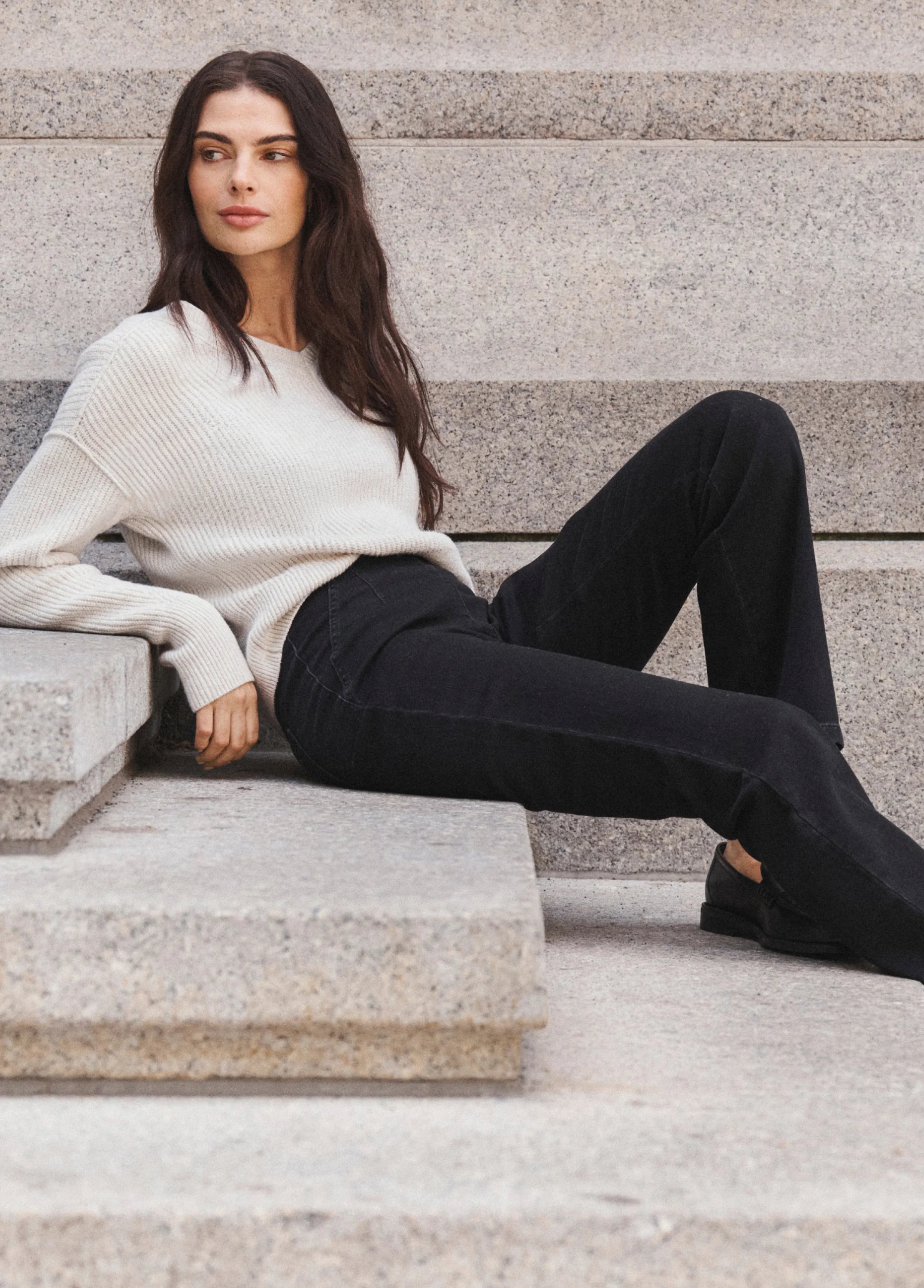 Cream ribbed long-sleeve sweater, relaxed fit, and crew neck.